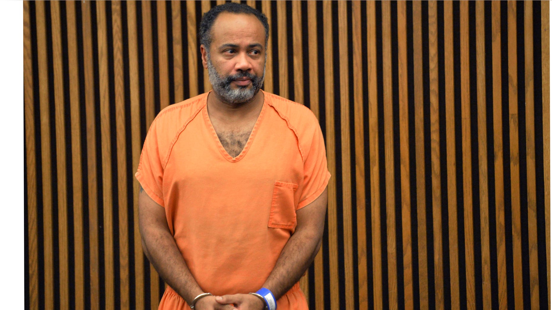 Oct. 16, 2015 - Robert Rembert Jr. appears during his arraignment in Cuyahoga County Common Pleas Court in Cleveland. The Cleveland truck driver, 45, pleaded not guilty to multiple counts of aggravated murder in the slayings of 4 people.