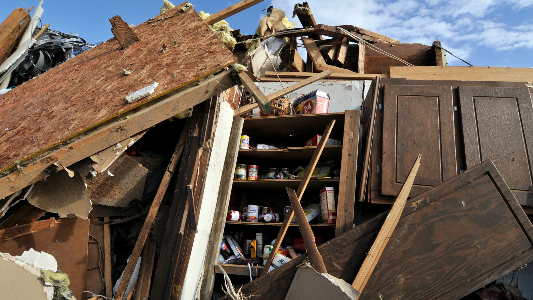 Dec. 31, 2010: Canned goods lie inside the pantry of a home destroyed by a tornado that tore through the small town of Cincinnati, Ark., on New Year's Eve.