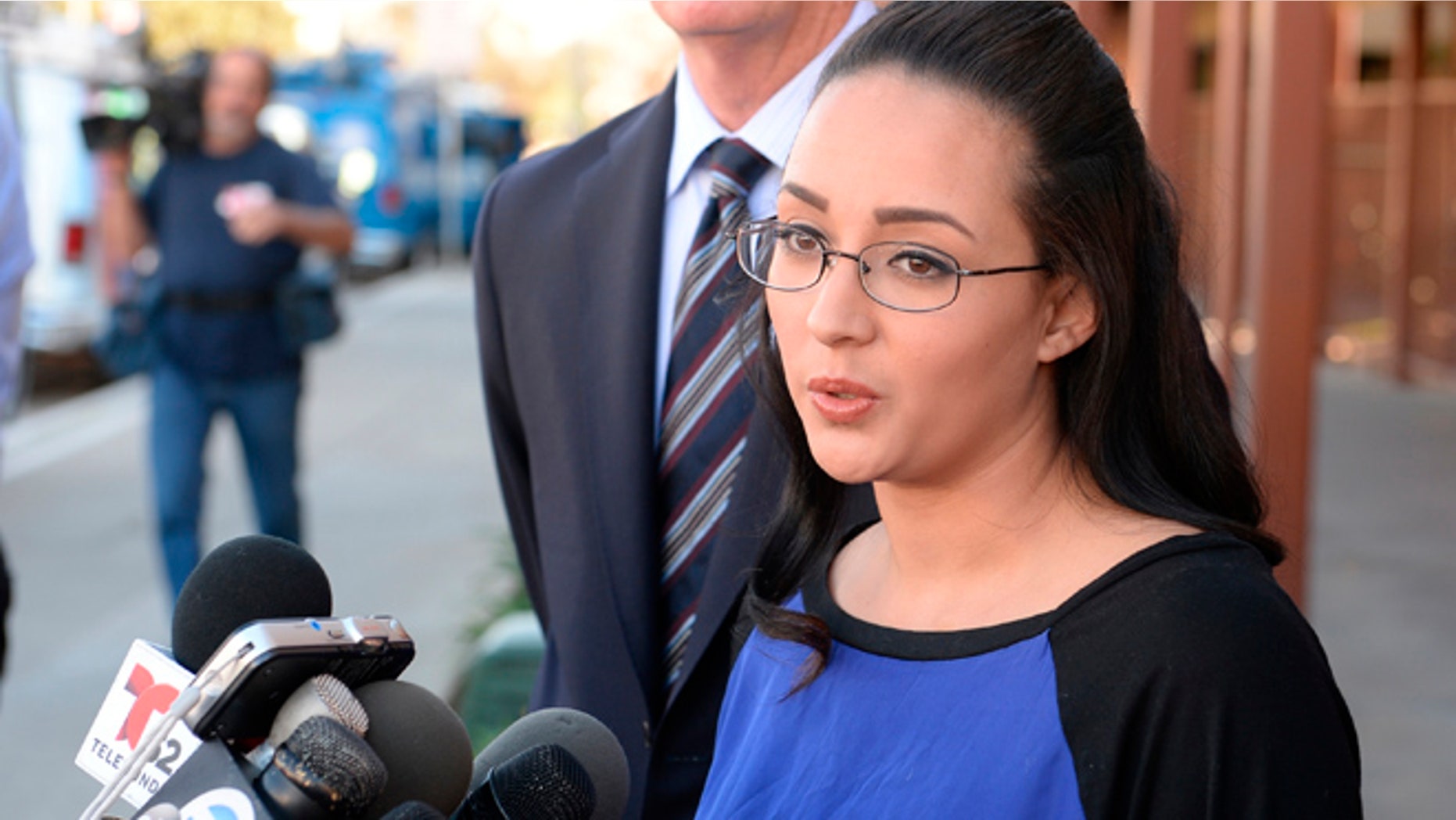 Jan. 20: A woman who identified by her first name, Jamie, speaks at a news conference in front of Alhambra High School in Alhambra, Calif., where Andrea Cardosa, not seen, last worked as vice principal of student services.