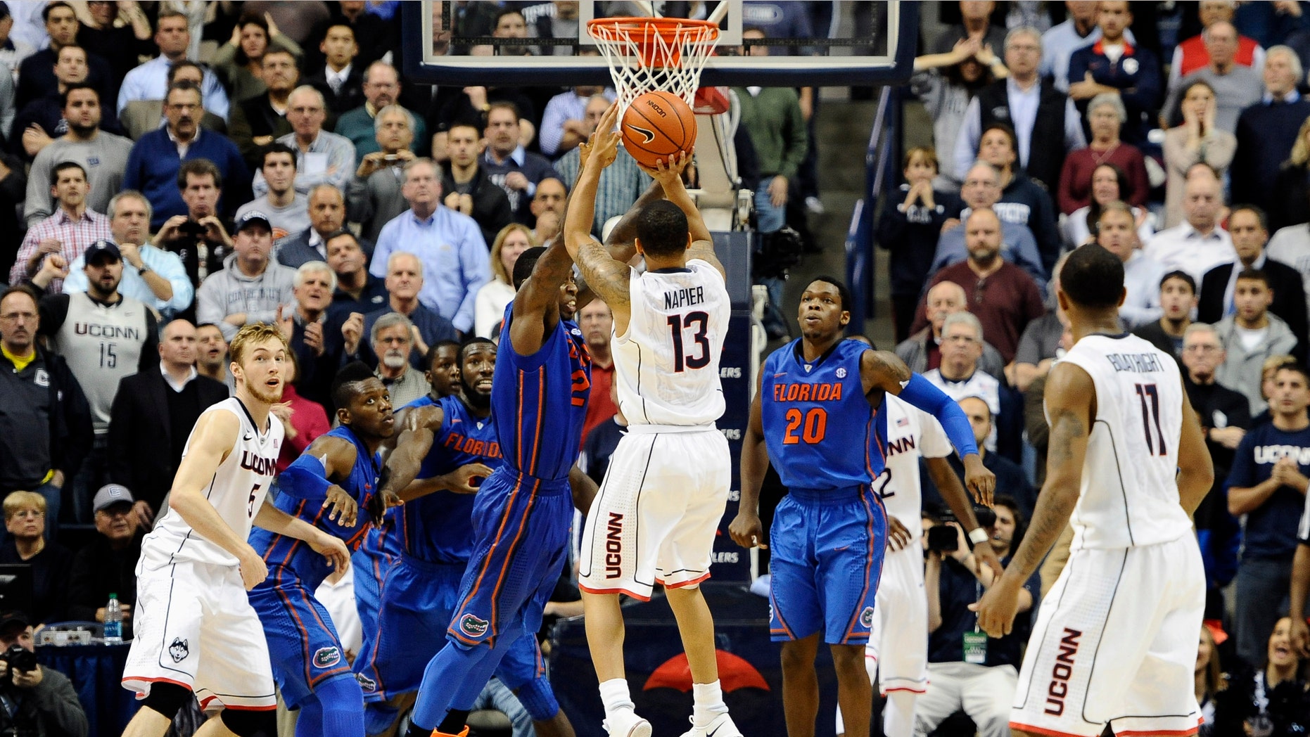 Napier goes up for the game winning basket at the buzzer on Monday, Dec. 2, 2013, in Storrs, Conn.
