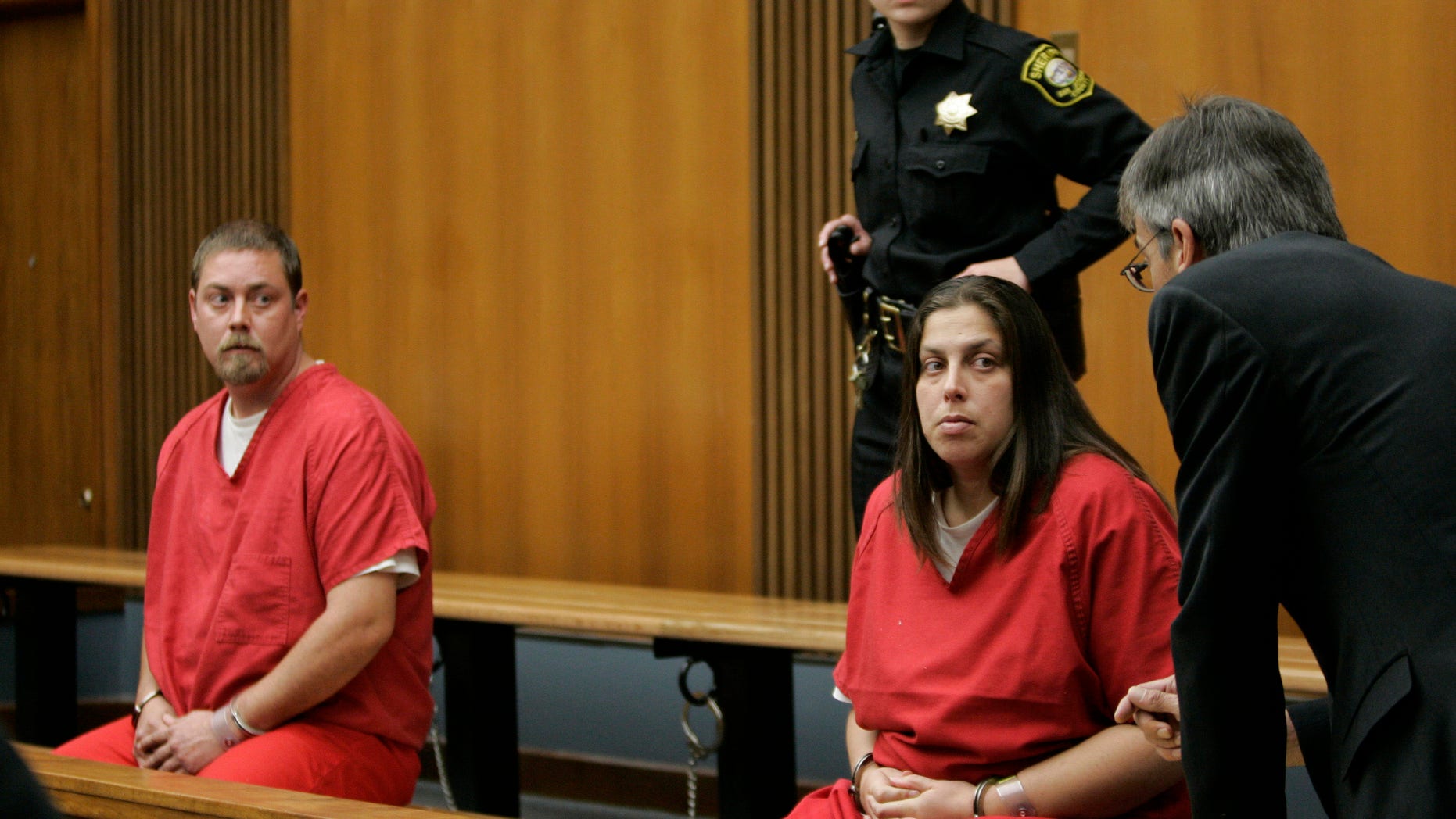Dec. 4, 2008: Kelly Layne Lau, 30, and her husband Michael Schumacher, 34, appear in a Stockton, Calif., courtroom. Both admitted to kidnapping and torturing a then 16-year-old boy authorities say was sometimes kept shackled inside their home.