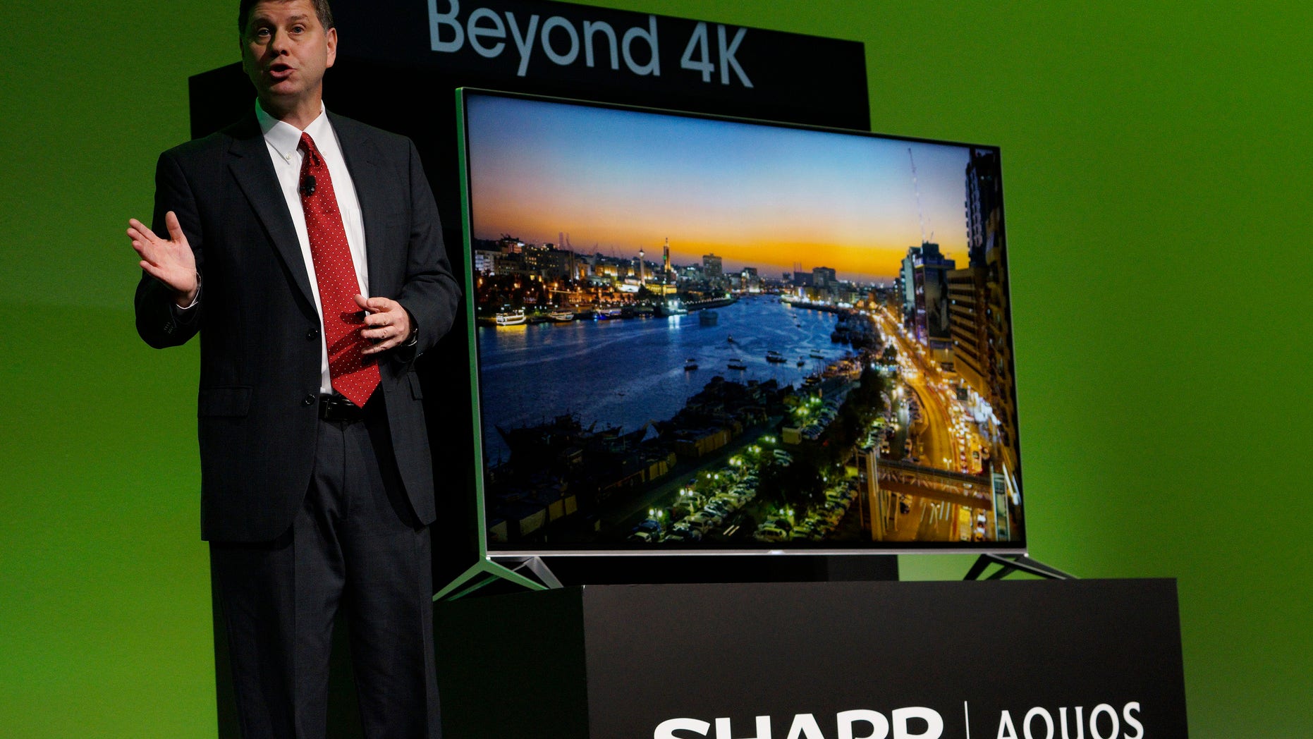 File photo. Jim Sanduski, President of Sharp Electronics Marketing Corporation of America Electronics, unveils the new Sharp Aquos Beyond 4K television at the Sharp press conference at the International Consumer Electronics show (CES) in Las Vegas, Nevada January 5, 2015.