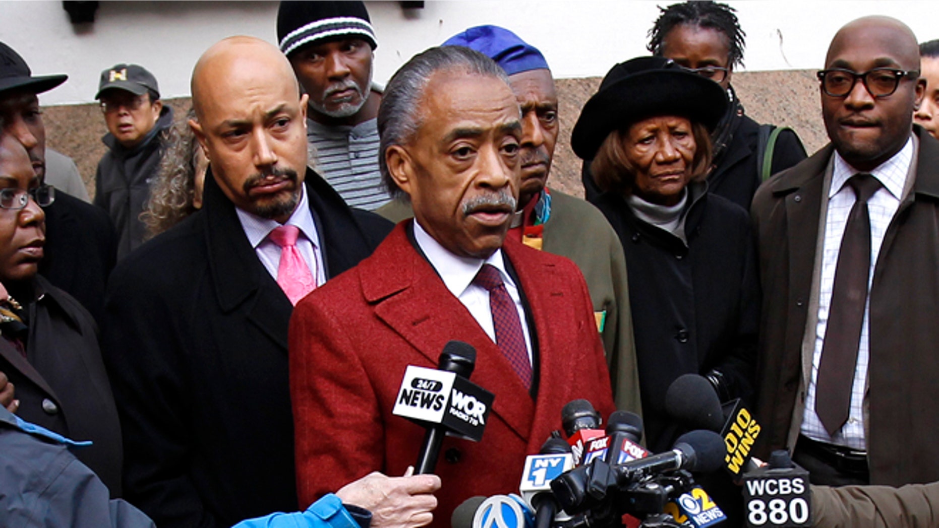 FILE: Nov. 4, 2013: The Rev. Al Sharpton speaks to the media outside Macy's department store, in New York City, N.Y.