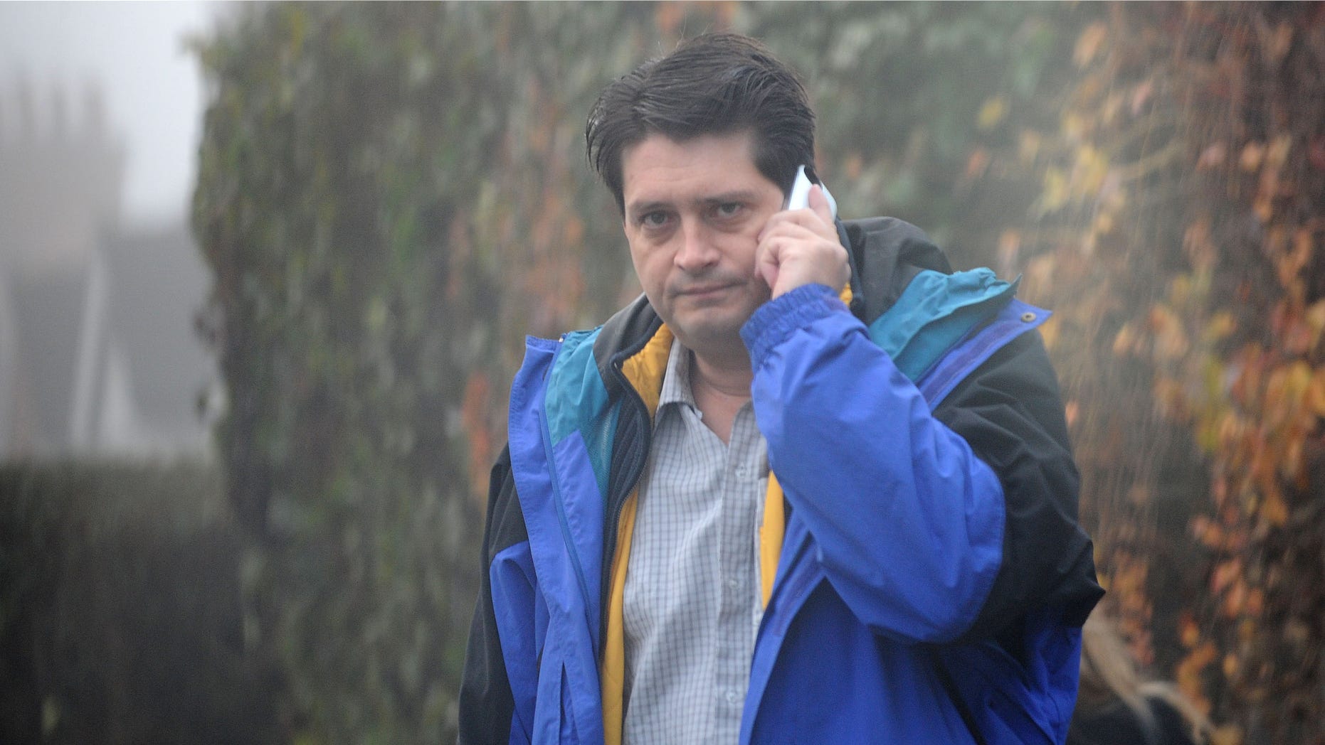 December 1, 2011: Shawn Sullivan,42, on the streets on London where he now lives with wife Sarah Smith, an executive at the Ministry of Justice while avoiding conviction for allegations of three separate cases of sexual assault on minor children in the U.S.