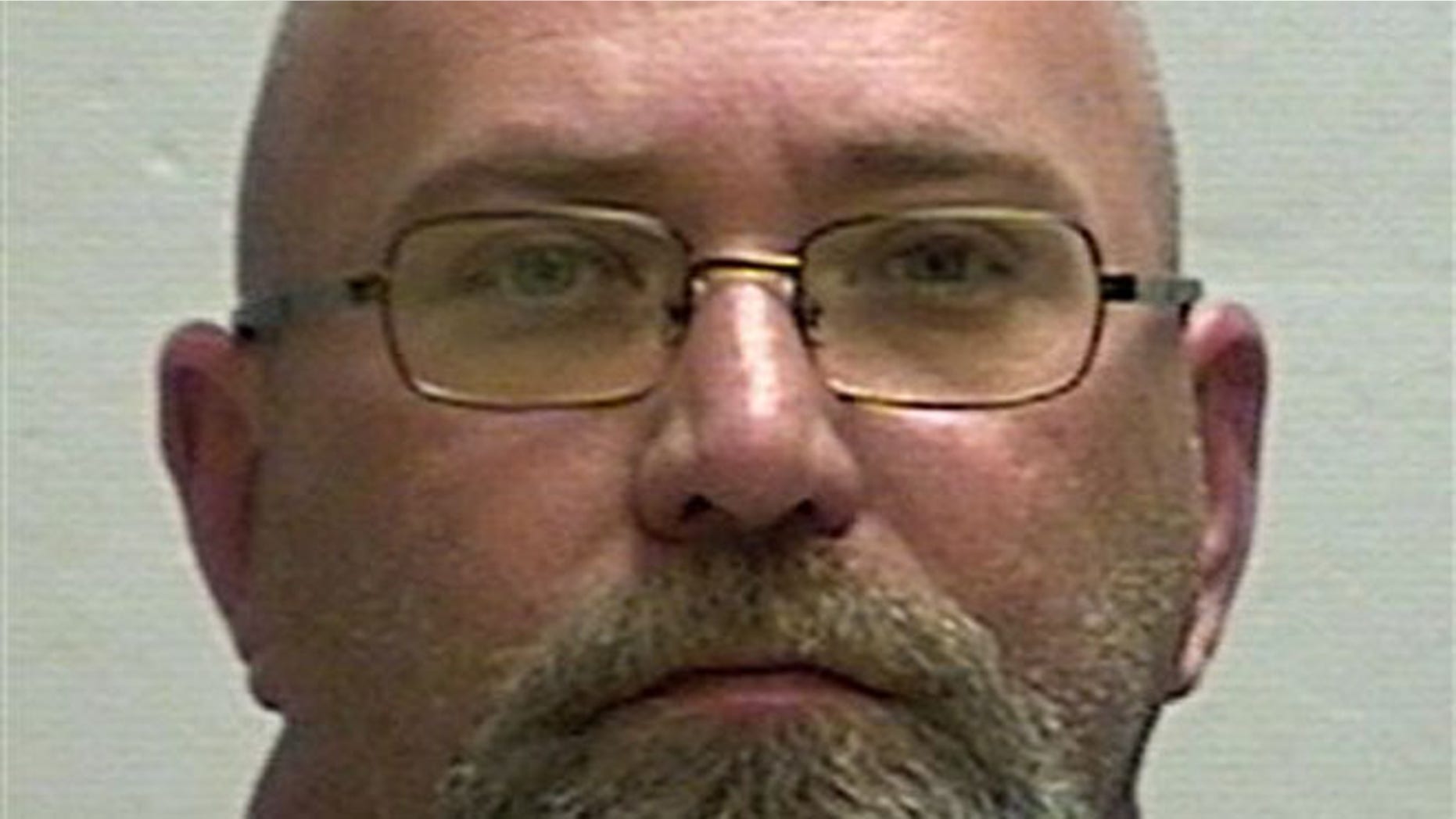 This undated file photo provided by the Clay County, Mo., Detention Center shows Rev. Shawn Francis Ratigan.