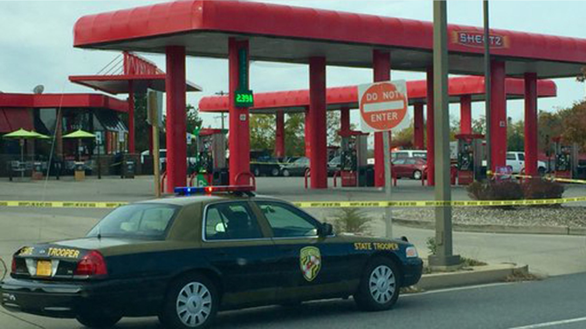 A man was reportedly shot outside a Maryland gas station by a state trooper on Monday.