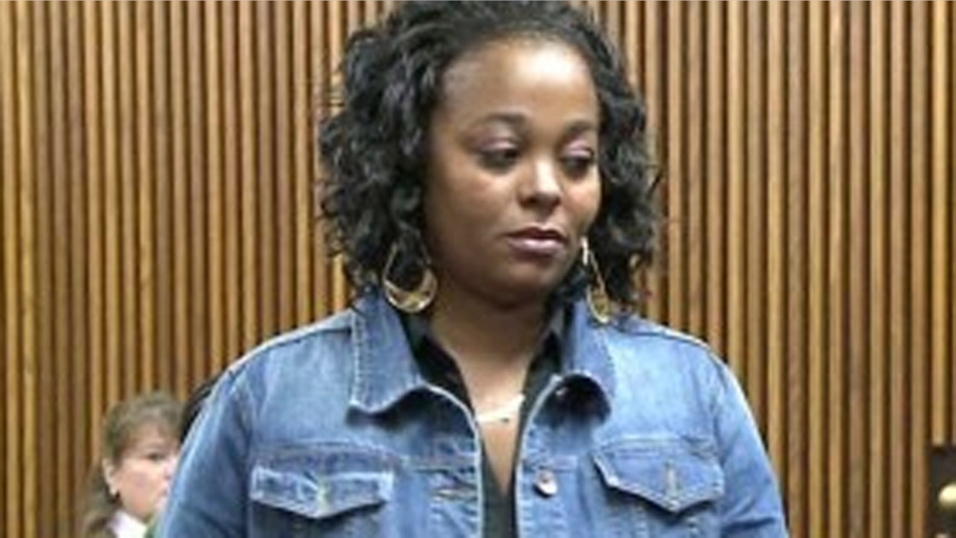 Shena Hardin was ordered to stand at an intersection for two days next week wearing a sign saying: 'Only an idiot drives on the sidewalk to avoid a school bus.'