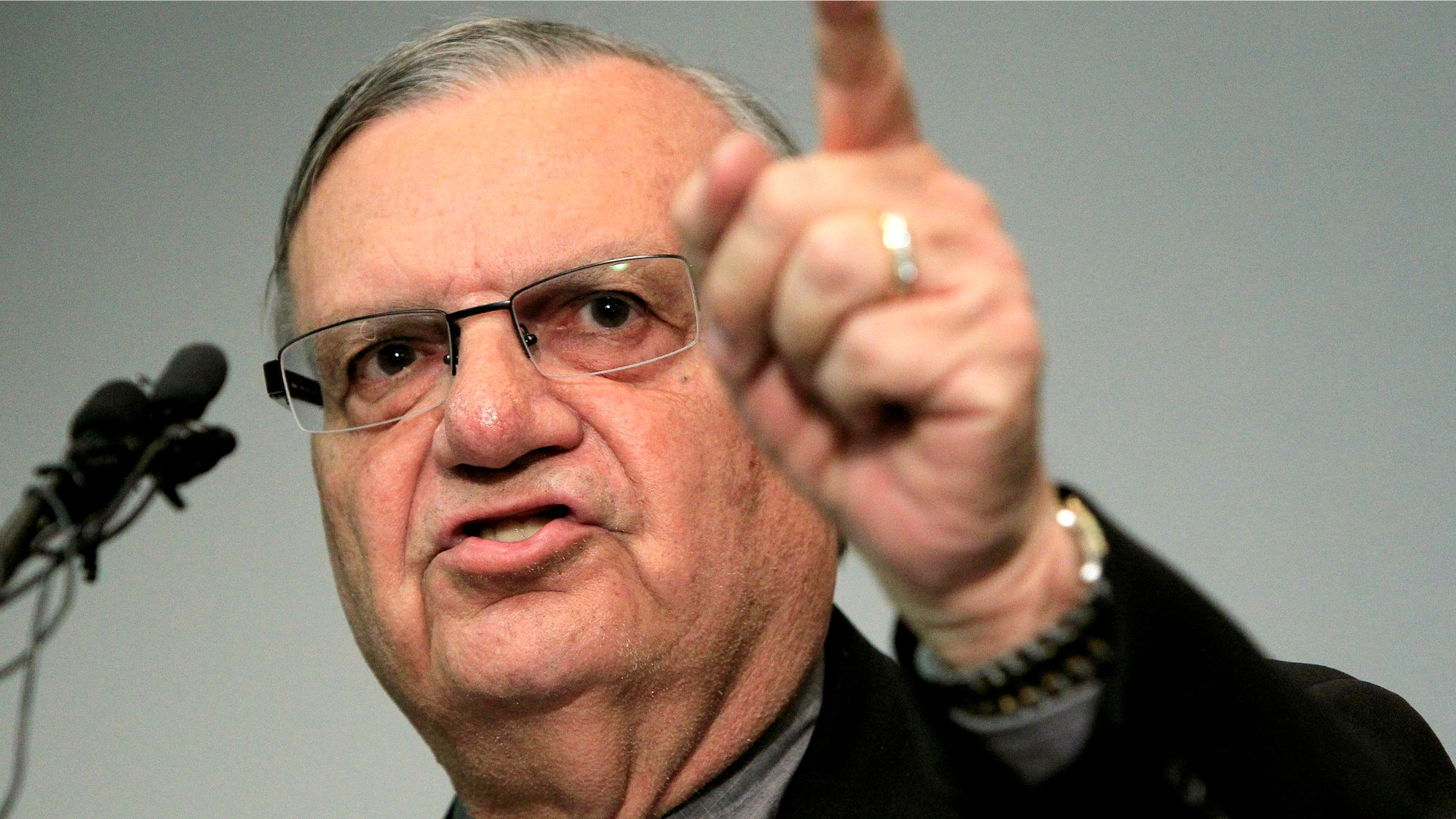 In this Dec. 21, 2011 file photo, Maricopa County Sheriff Joe Arpaio speaks to the media in Phoenix. (AP Photo/Ross D. Franklin, File)