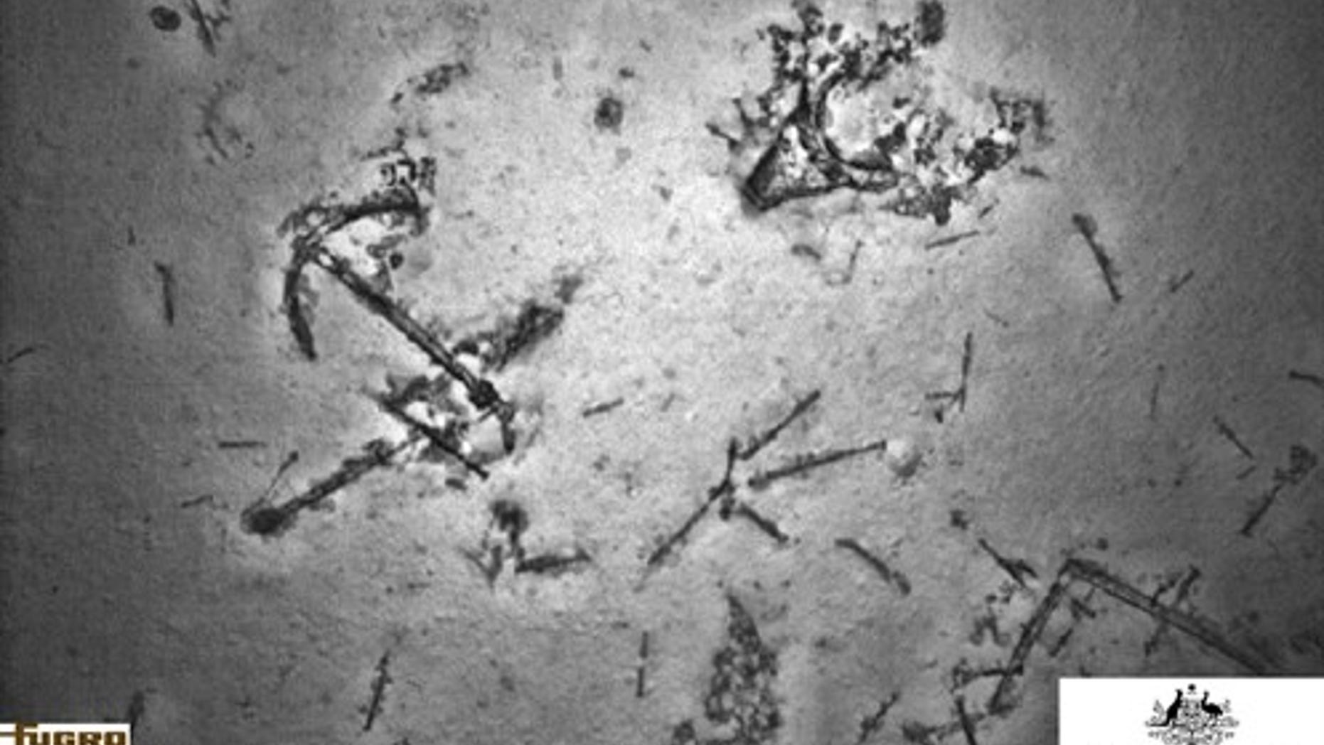 Ship-related debris on the sea floor, including an anchor.