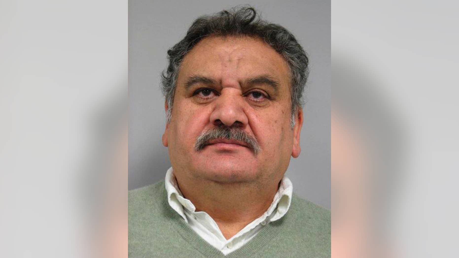 This December 2013 photo provided by the Palatine Police Department in Palatine, Ill., shows Branko Bogdanov, 58, of Northbrook, Ill. On Monday, March 10, 2014, a federal judge in Chicago is scheduled to decide whether Bogdanov, his 52-year-old wife Lela Bogdanov and their 34-year-old daughter, Julia Bogdanov, charged in an alleged $7 million shoplifting spree must stay behind bars. They were arrested last week at their luxury home in Northbrook. They are charged with one count each of interstate transportation of stolen property. (AP Photo/Courtesy of the Palatine Police Department)