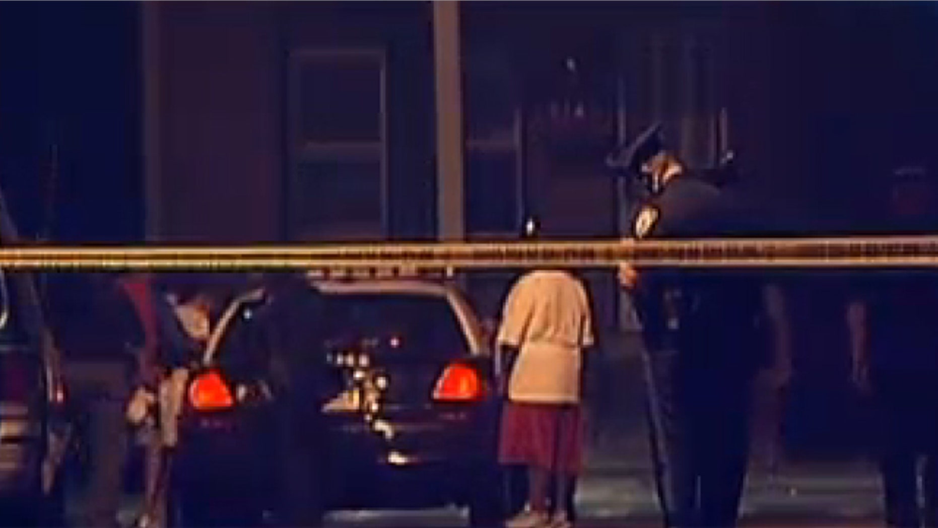 Sept. 1, 2012: The scene outside a home where siblings were stabbed while sleeping.