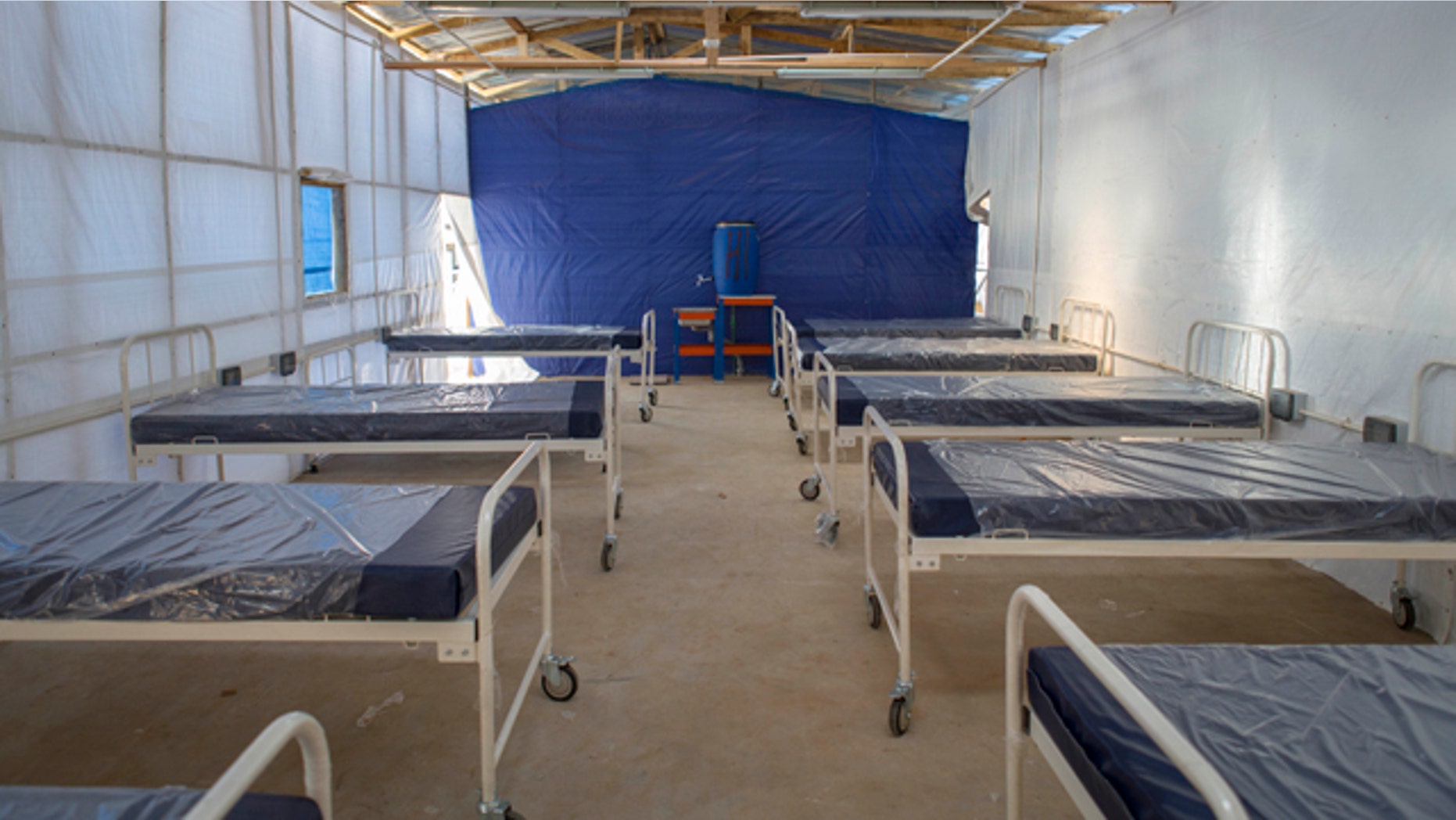 November 5, 2014: This undated handout photo issued by Save the Children UK shows equipment still wrapped in plastic inside what will be the red zone of the Kerry Town Ebola Treatment Centre in Sierra Leone. (AP Photo, Louis Leeson/Save the Children UK)