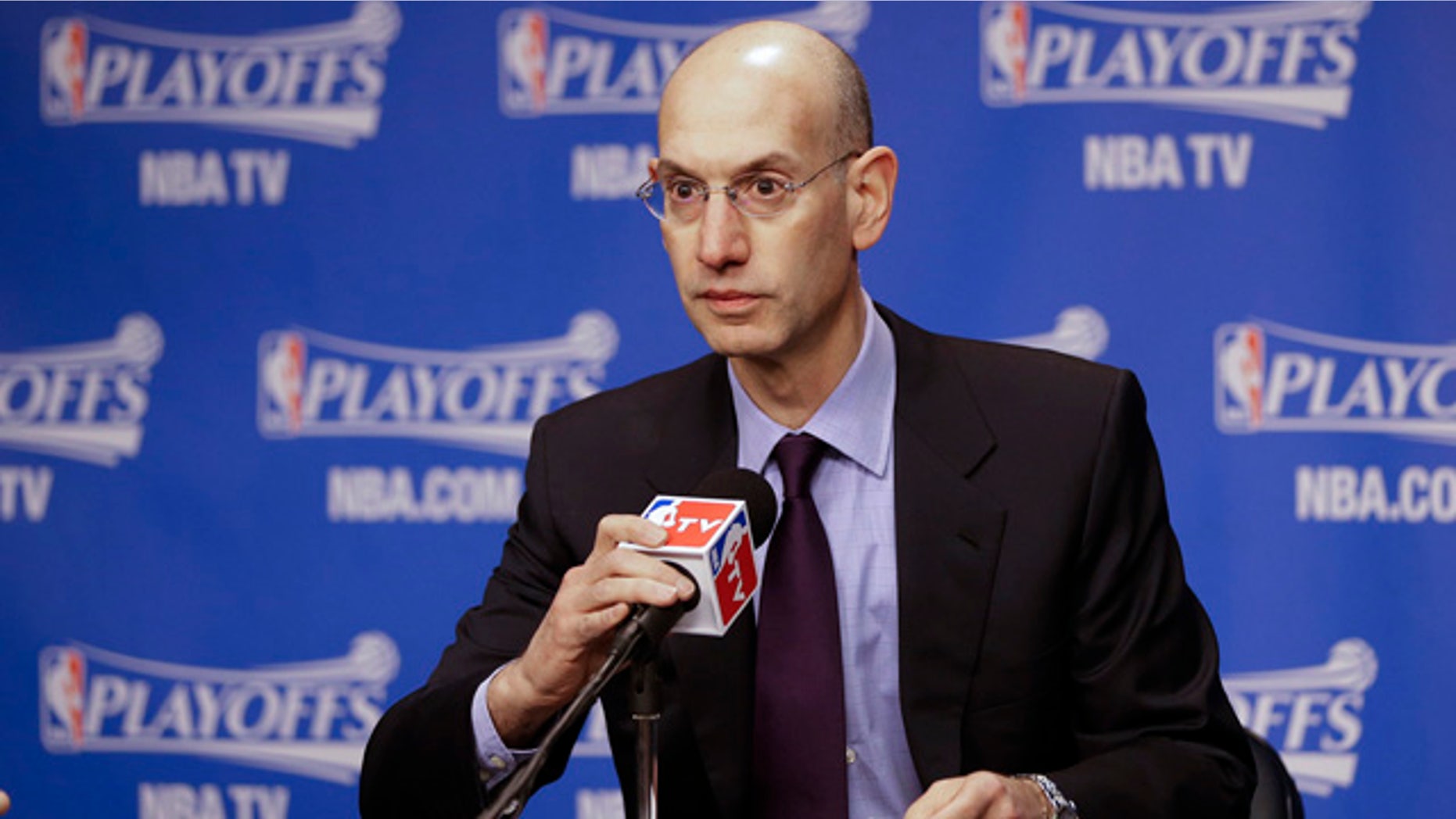 April 26, 2014: NBA Commissioner Adam Silver listens during a news conference before Game 4 of an opening-round NBA basketball playoff series between the Memphis Grizzlies and the Oklahoma City Thunder. (AP Photo/Mark Humphrey)