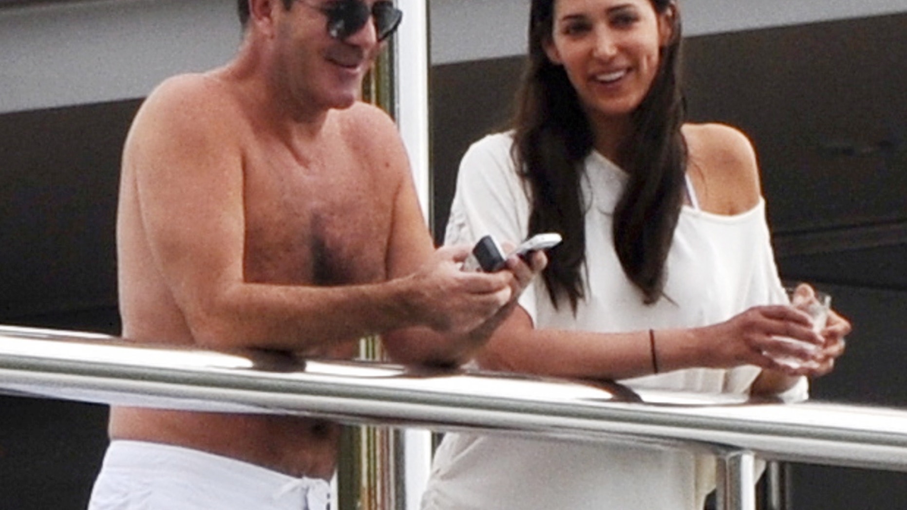 Simon Cowell soaking up the sun with Lauren Silverman in Saint Barths on January 4, 2012.