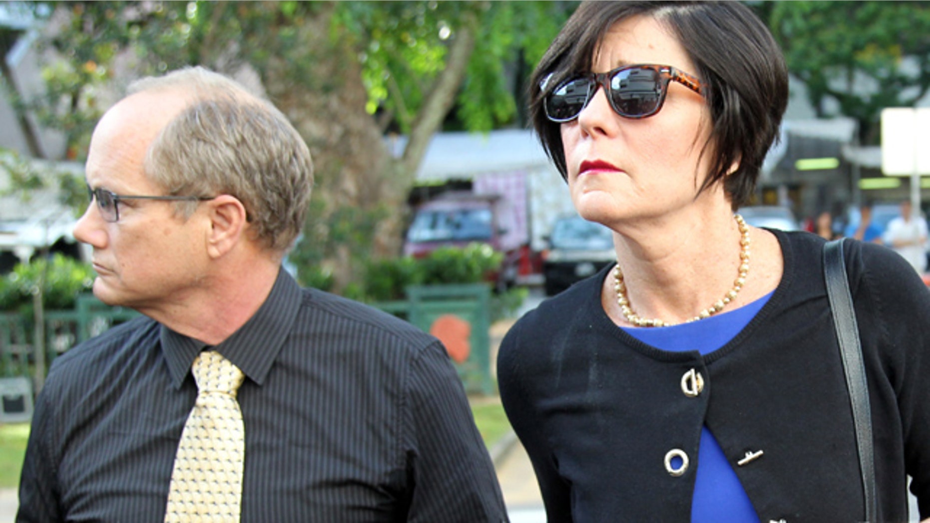 May 13, 2013: Parents of late American Shane Todd, Mary, right, and Rick Todd, left, arrive at the Subordinate Courts.