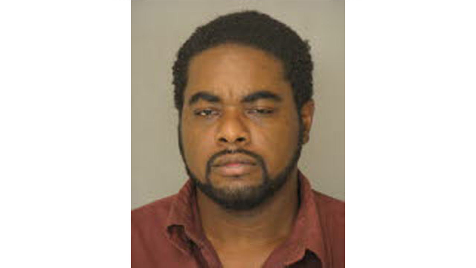 This undated photo provided by the Pittsburgh Police shows Allen Darell Wade. Pittsburgh police charged Wade on Wednesday with killing 44-year-old Susan Wolf and her sister, 38-year-old Sarah Wolfe during a break-in and robbery at their home. Their bodies were found Feb. 7, 2014. The two were sisters of an Iowa state lawmaker. According to police, Wade was arrested Wednesday afternoon. (AP Photo/Pittsburgh Police)