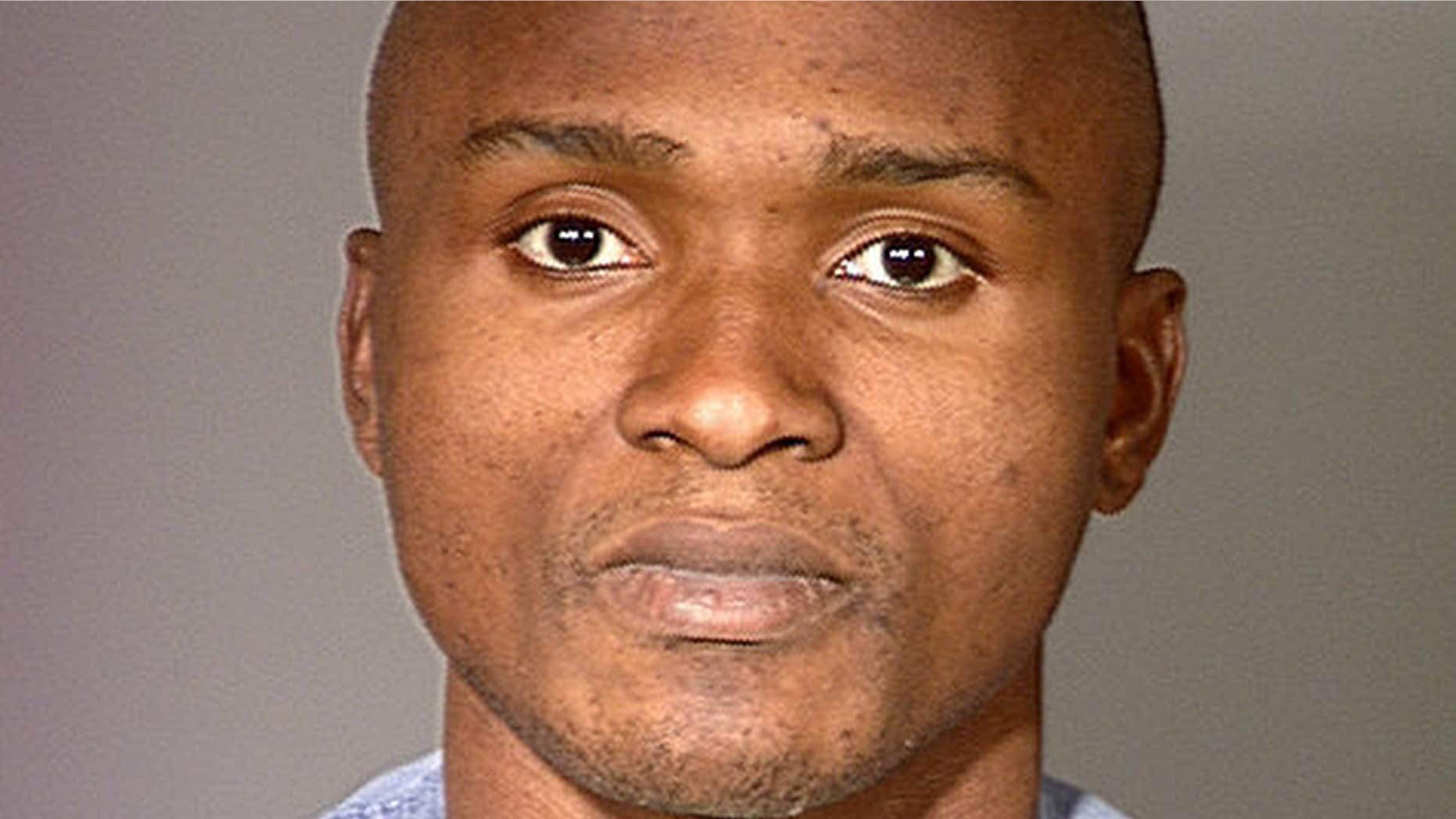 Feb. 2000: Charly Keundeu Keunang after his arrest for robbery.