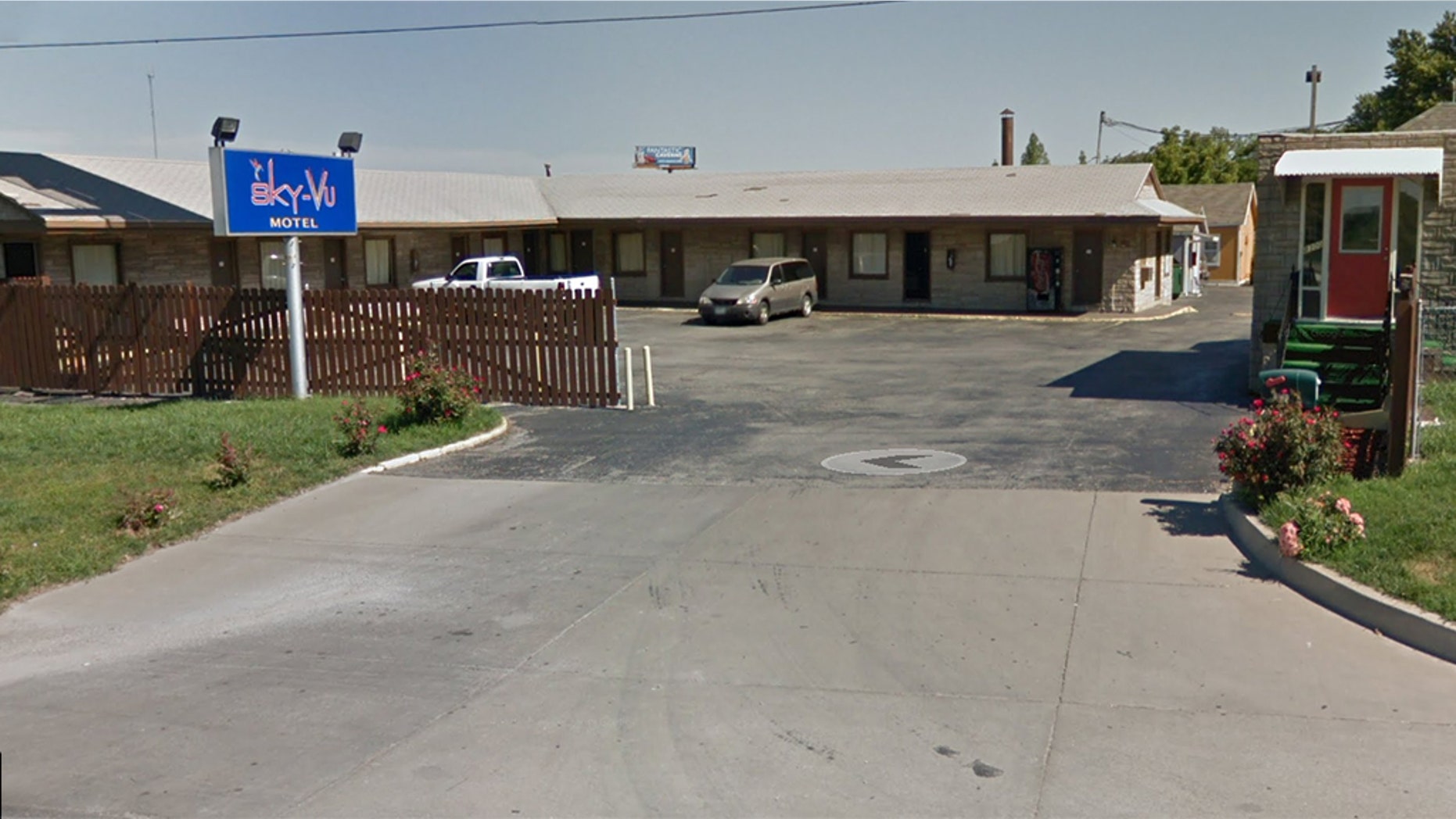 Two undercover cops were working on an investigation at the Sky-Vu Motel (pictured) in Kansas City, Missouri, when they were shot about 12:15 p.m. One of the three wounded officers was hit after police started to exchange gunfire with the suspect. (Google Maps)