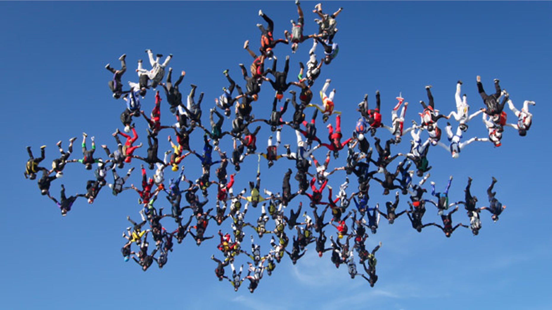 Aug. 3: In this image provided by Brian Buckland, 138 skydivers form a massive snowflake formation over Ottawa, Ill.