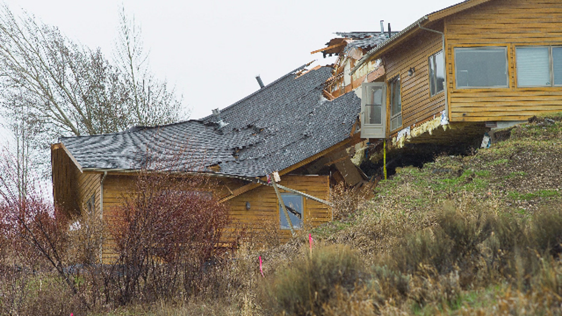 April 18. 2014: A house breaks apart as a slow-moving landslide in Jackson, Wyo. advances downhill.
