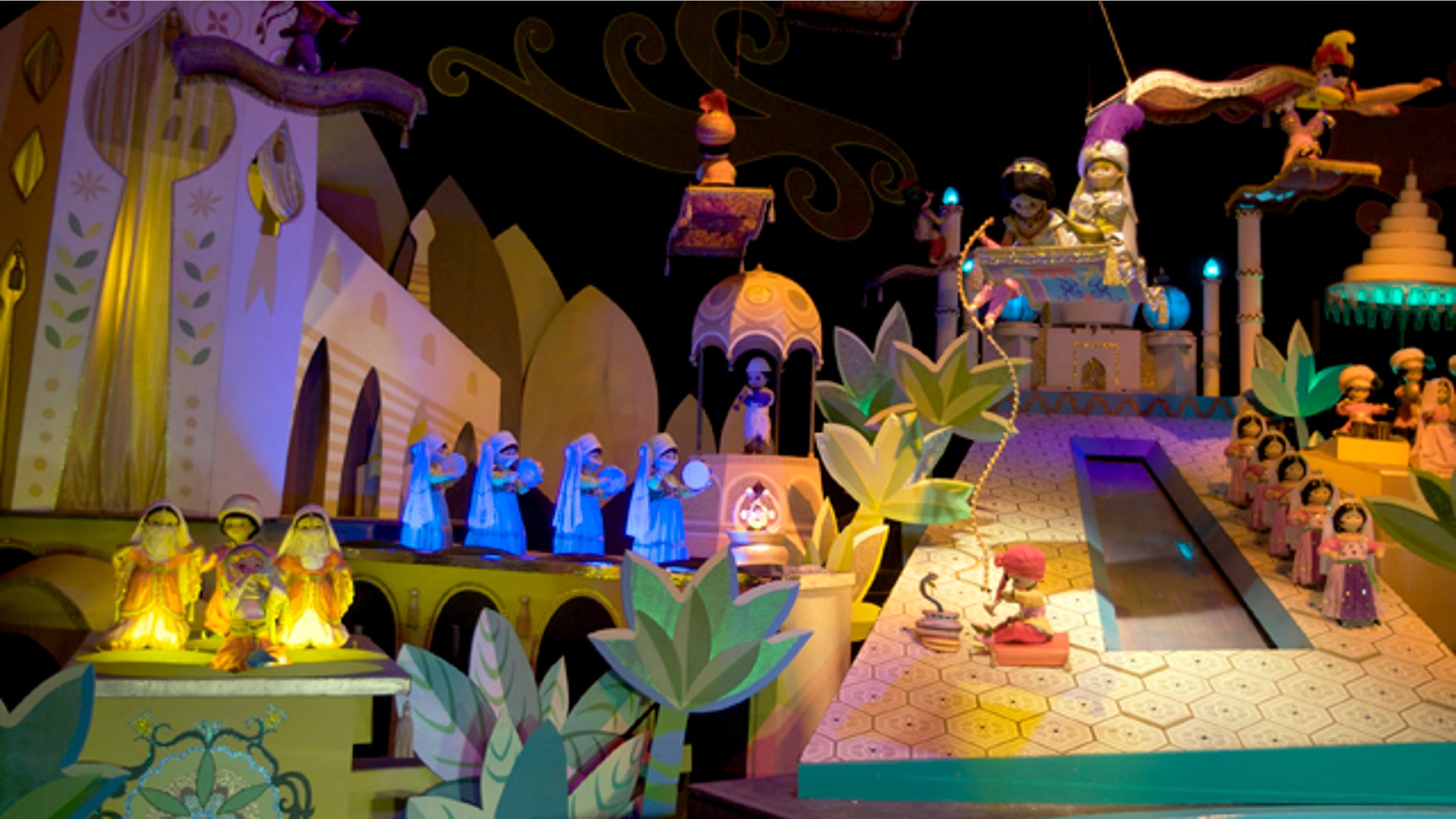 The characters Aladdin, Jasmine and Abu from the film, "Aladdin," on the "It's A Small World" ride, at Disneyland in Anaheim, Calif.