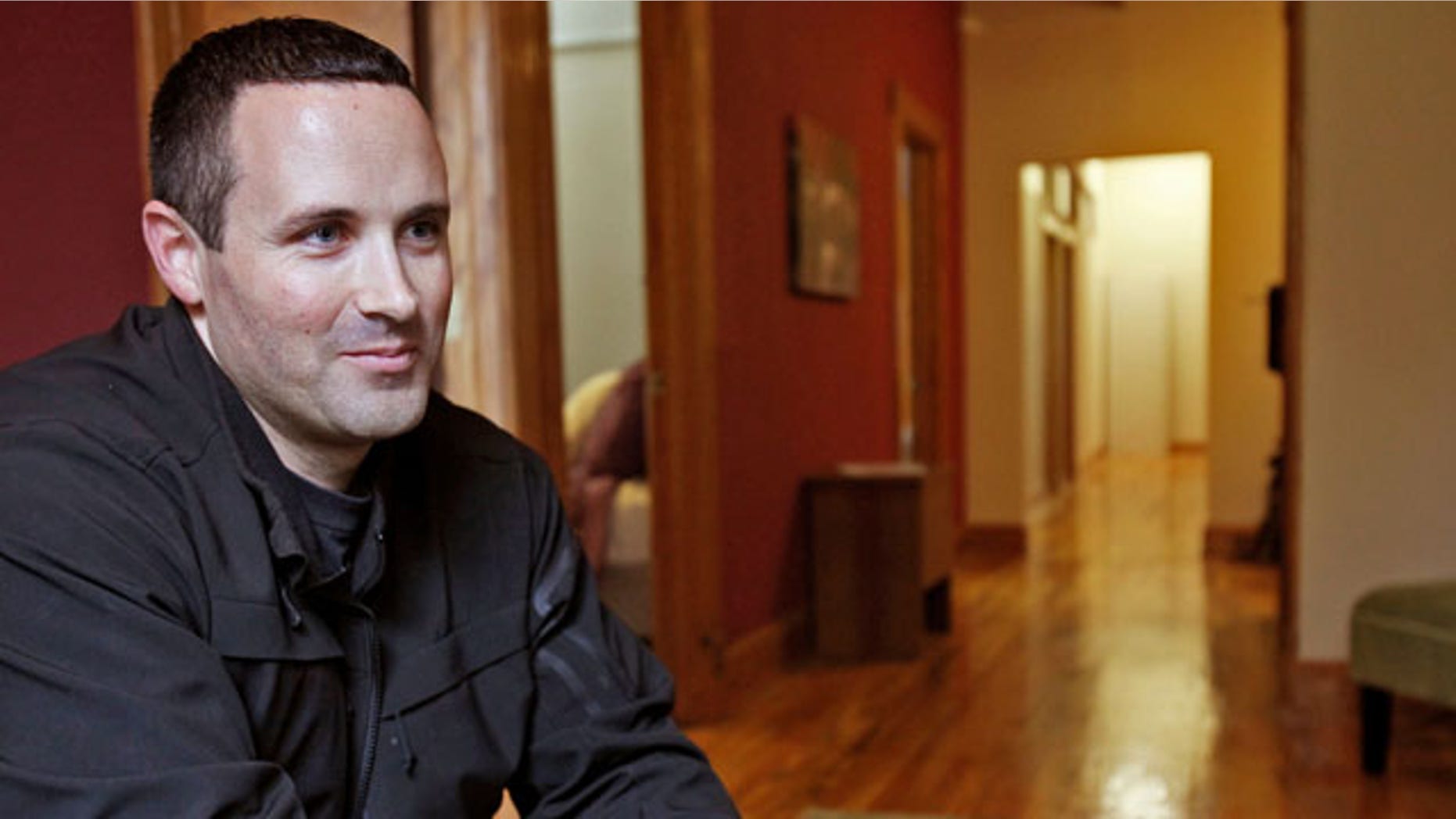 October 15, 2013: Matthew Hurtado talks about The Snuggle House in downtown Madison, Wis. Customers at Madison’s new Snuggle House can snuggle with professional cuddlers for $60 an hour. Supporters say the business helps people relax through non-sexual touch. But city officials suspect the Snuggle House may be a thinly veiled brothel and cuddling will lead to sexual assault. Hurtado’s past is raising red flags; he has filed for bankruptcy twice, written a book about a sex addict meeting a supernatural being and according to city attorneys has worked as a stripper. (AP/File)