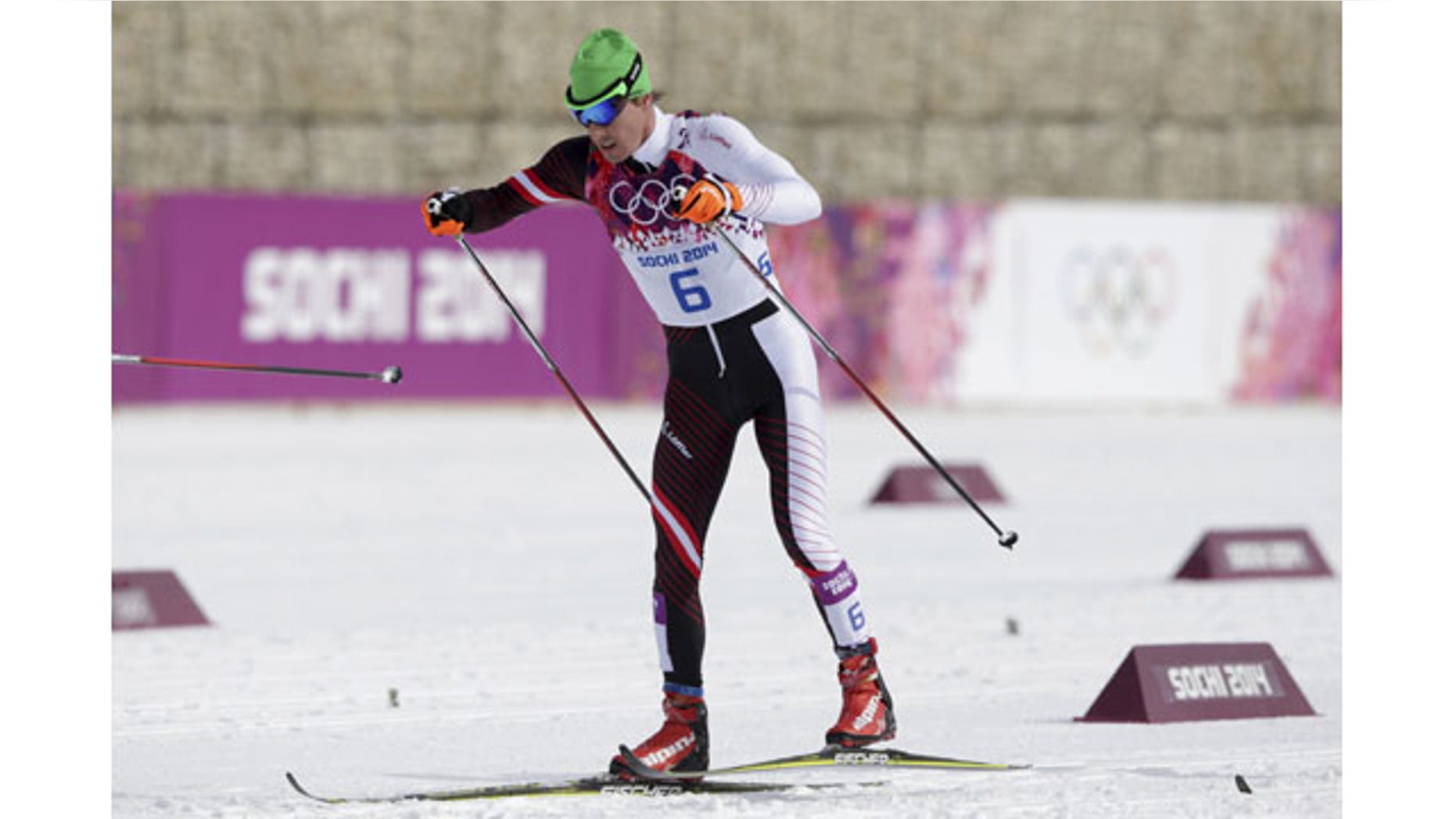 February 9, 2014: Austria's Johannes Duerr competes during the men's cross-country 30k skiathlon at the 2014 Winter Olympics in Krasnaya Polyana, Russia. Duerr has been kicked out of the Sochi Games after testing positive for EPO. It is the fifth doping case of the Olympics and the first involving the blood-boosting drug EPO. (AP Photo/Matthias Schrader)