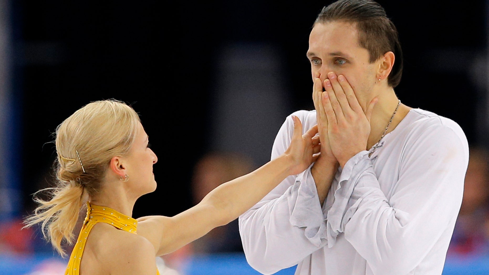 Feb. 12, 2014: Tatiana Volosozhar and Maxim Trankov of Russia react after they competed in the pairs free skate figure skating competition at the Iceberg Skating Palace during the 2014 Winter Olympics in Sochi, Russia.