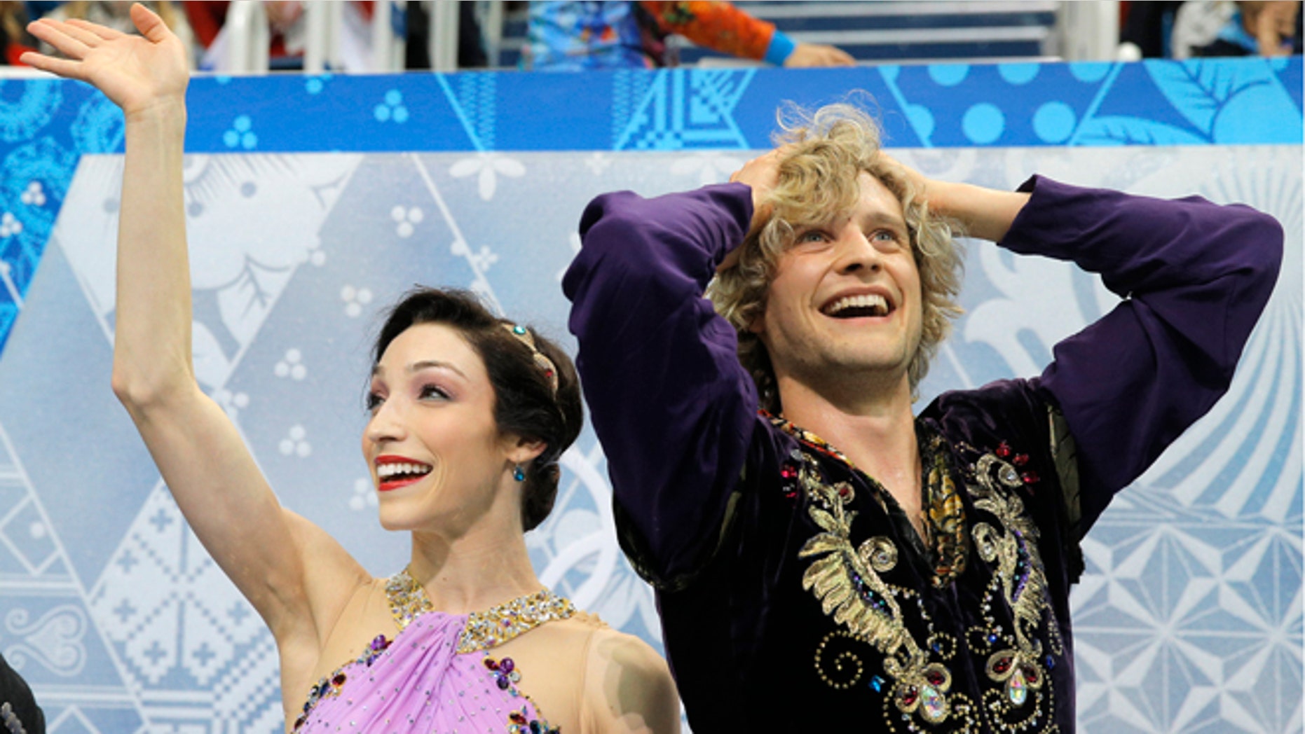 Feb. 17, 2014: Meryl Davis and Charlie White of the United States react in the results area after competing in the ice dance free dance figure skating finals at the Iceberg Skating Palace during the 2014 Winter Olympics in Sochi, Russia.