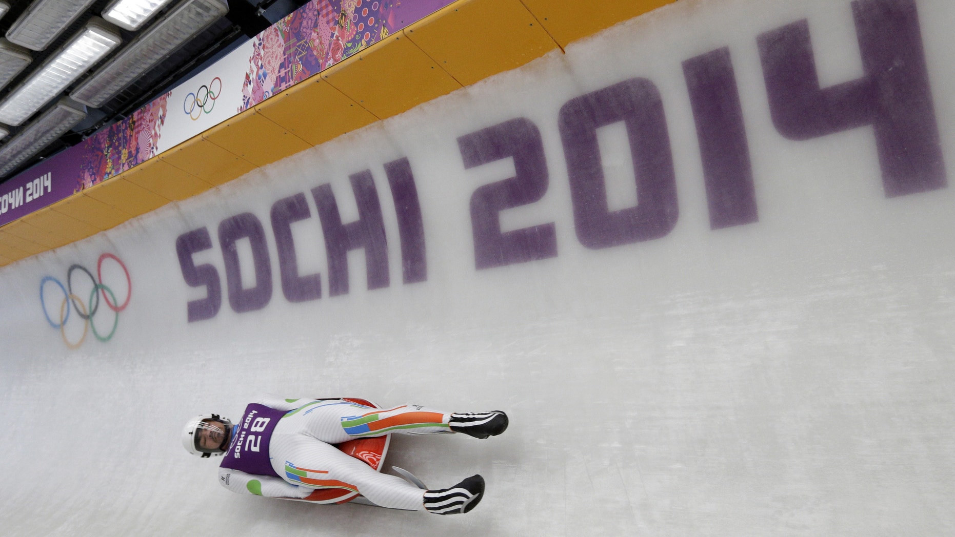 Feb. 6, 2014: Shiva Keshavan, who if from India but is competing under the Olympics flag, takes a turn during a training session for the men's singles luge at the 2014 Winter Olympics.