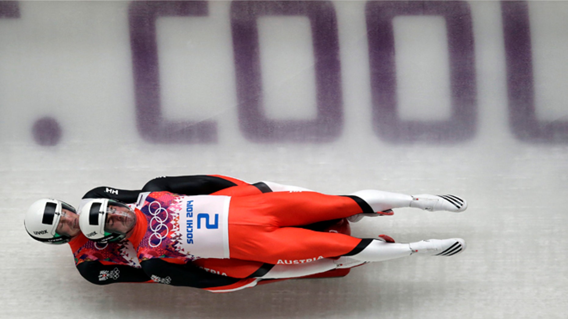 Feb. 12, 2014: The doubles team of Andreas Linger and Wolfgang Linger of Austria speed down the track in their final run during the men's doubles luge at the 2014 Winter Olympics.