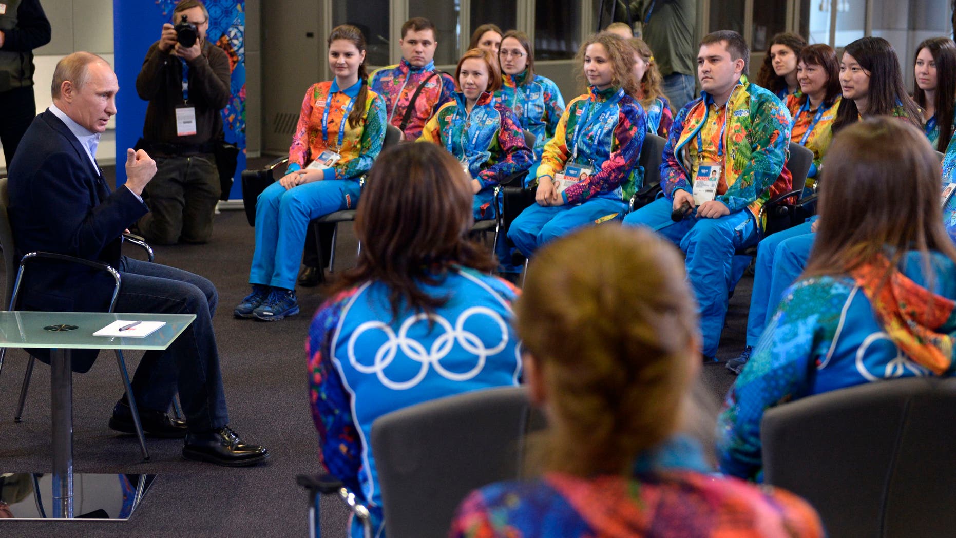 Jan. 17, 2014 - Russian President Vladimir Putin speaks at his meeting with Olympic volunteers in the Black Sea resort of Sochi, Russia. Putin says gays should feel welcome at the upcoming Winter Olympic Games in Sochi, but they must "leave the children in peace."