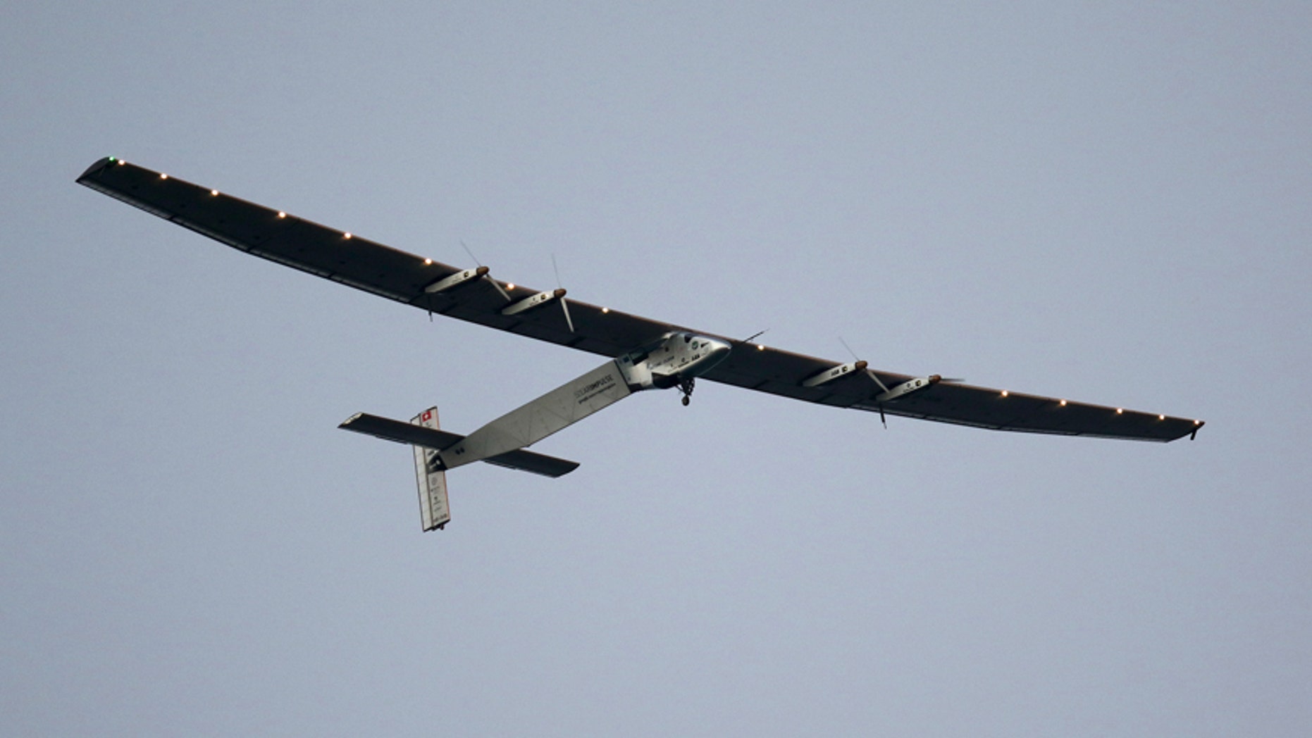 File photo - The Solar Impulse 2 airplane, piloted by Andre Borschberg, prepares to land at Kalaeloa airport after flying non-stop from Nagoya, Japan in Kapolei, Hawaii, July 3, 2015.