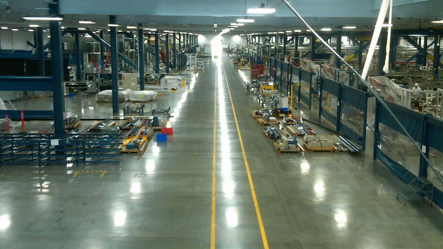 A view down the length of the massive Solyndra production floor, which will was auctioned off with the rest of the defunct company.