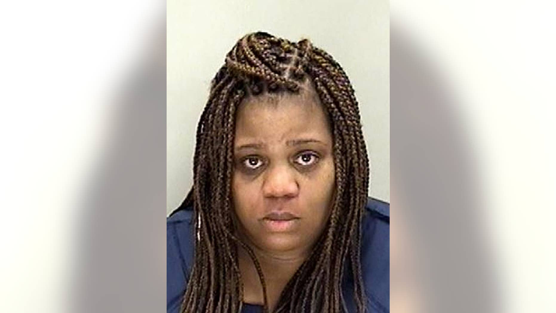 This May 26, 2015 booking photo provided by the Richmond County Sheriff’s Office shows Antonia Folsom, in Richmond County, Ga. Folsom was arrested after police say she locked her 13-year-old son out of the house overnight because he missed his curfew. (Richmond County Sheriff’s Office Via AP)