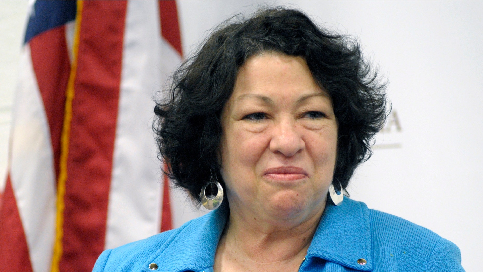 Supreme Court Associate Justice Sonia Sotomayor is introduced to speak at the University of the District of Columbia's David Clarke School of Law "Joseph Rauh, Jr., Conversation" in Washington, Monday, April 2, 2012. (AP Photo/Cliff Owen)