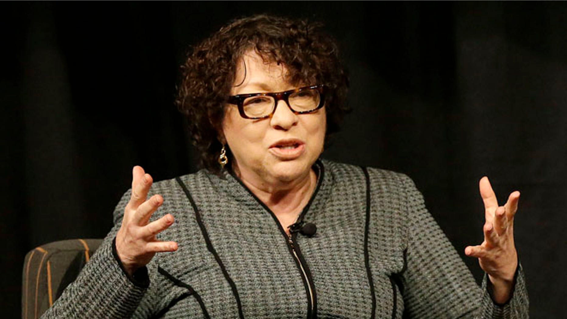 FILE - In this Oct. 20, 2014 file-pool photo, Supreme Court Justice Sonia Sotomayor speaks in San Jose, Calif. Sotomayor delivered an impassioned plea to an admiring audience to get involved in politics and legislative elections during a public appearance on Wednesday, April 6, 2016, at a private college perched in the hills of northern New Mexico. Sotomayor walked the isles of an auditorium, clasping hands with scores of people while fielding questions about judicial philosophy and describing her hard-scrabble upbringing in a Bronx tenement. (AP Photo/Jeff Chiu, Pool, File)