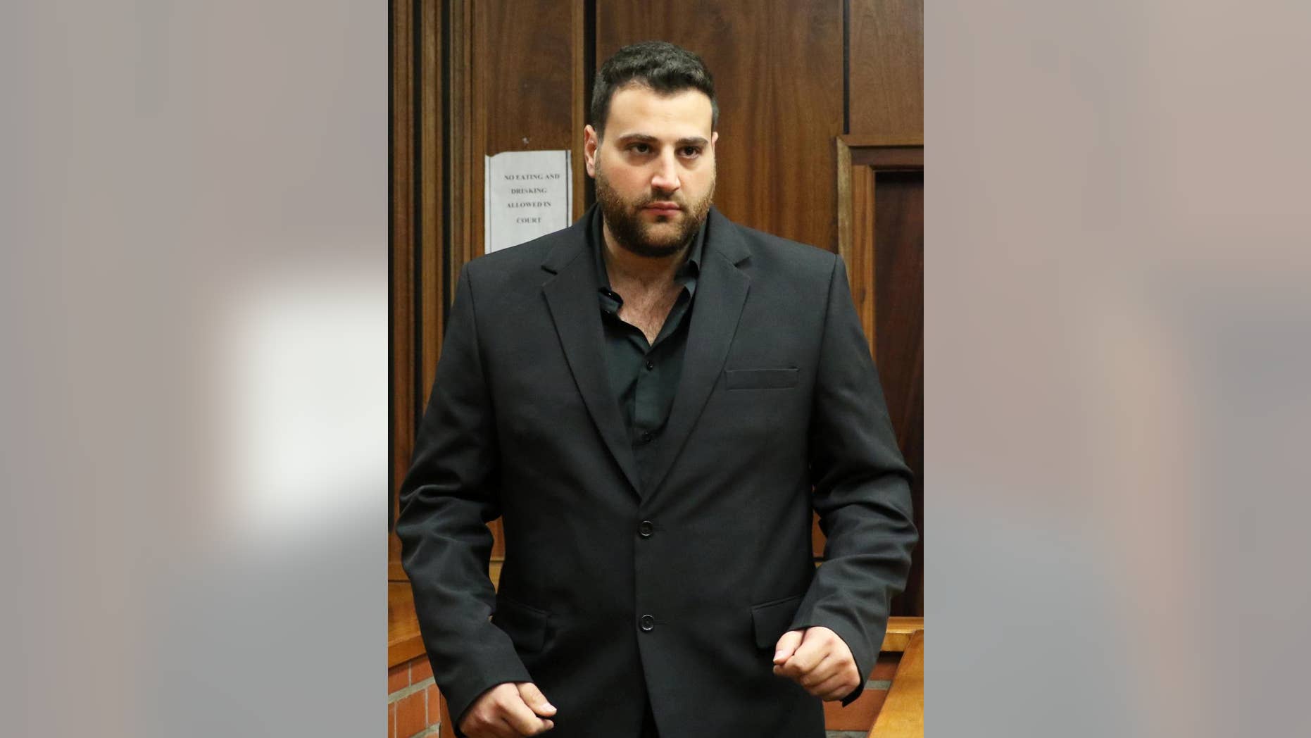 FILE - In this file photo taken Monday, May 4, 2015. Christopher Panayiotou appears at a court to face a murder charge in Port Elizabeth, South Africa. Panayiotou's voice trembled as he delivered the eloquent tribute to schoolteacher Jayde Panayiotou at her funeral last month. Soon afterward, the businessman was accused of hiring men to kidnap and kill his wife in a sensational murder case that some South Africans, including the suspect, have compared to the trial of Olympian Oscar Pistorius for killing his girlfriend and Briton Shrien Dewani, who was acquitted of murdering his wife during their honeymoon. (AP Photo/Judy de Vega)