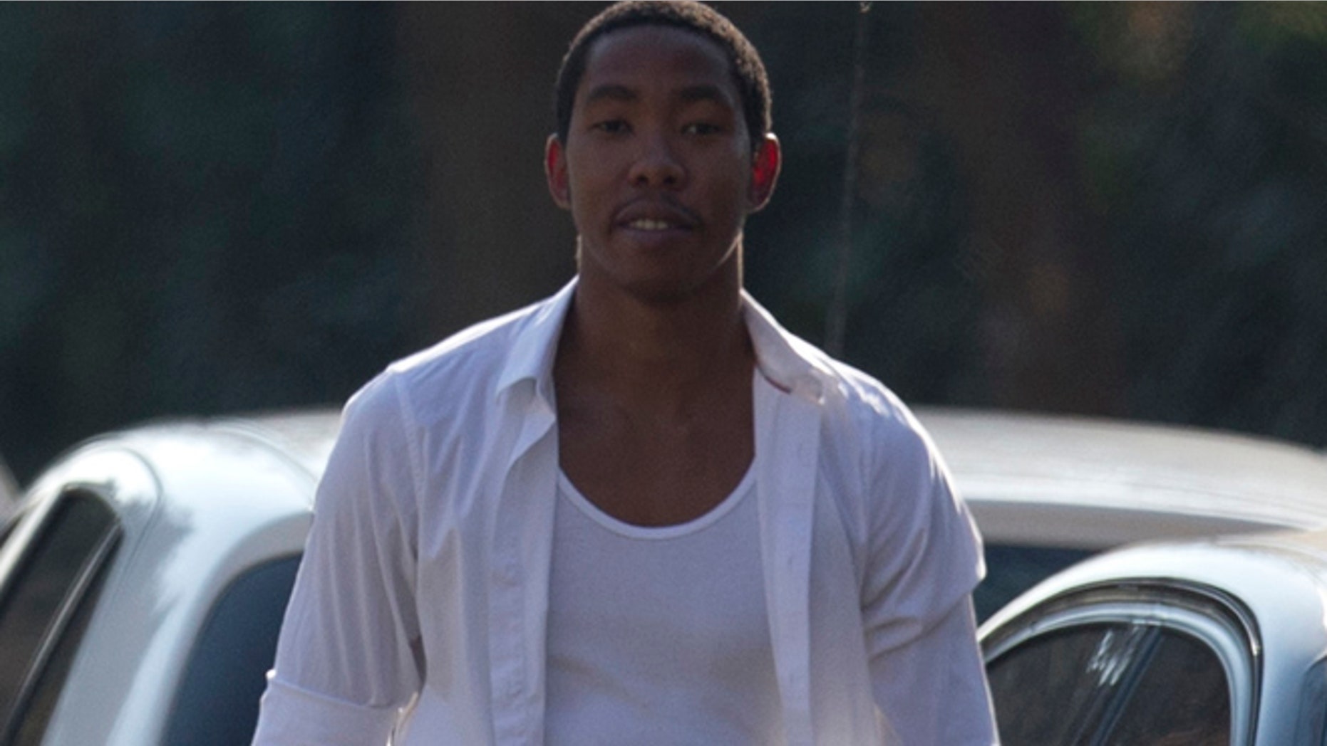 Mbuso Mandela, grandson of former South African President Nelson Mandela, walks outside of his grandfather's residence in Johannesburg in 2013.