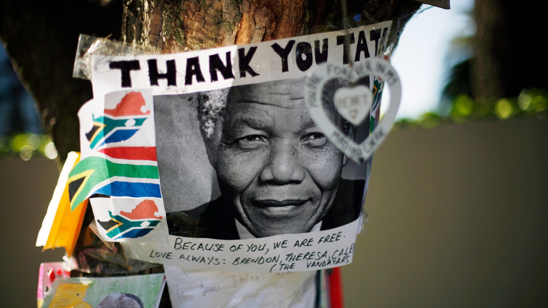 July 1, 2013 - Get well soon messages and drawings are seen outside Nelson Mandela's house in Johannesburg, South Africa. Former president Nelson Mandela remained in a critical condition at the Medi-Clinic Heart Hospital in Pretoria on Monday .