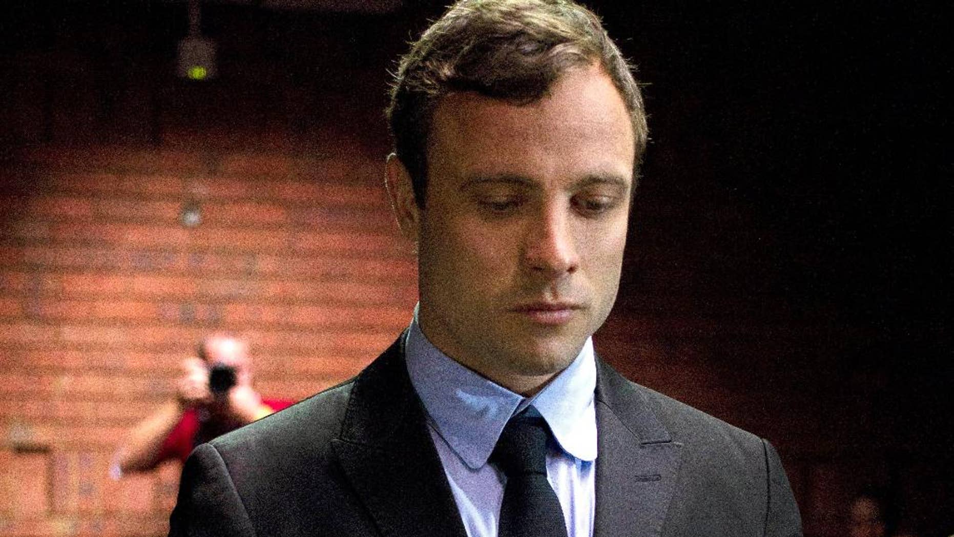 Aug. 19, 2013 - FILE photo of double-amputee Olympian Oscar Pistorius at the magistrates court to be indicted on charges of murder and illegal possession of ammunition for the shooting death of his girlfriend on Valentine's Day in Pretoria, South Africa.