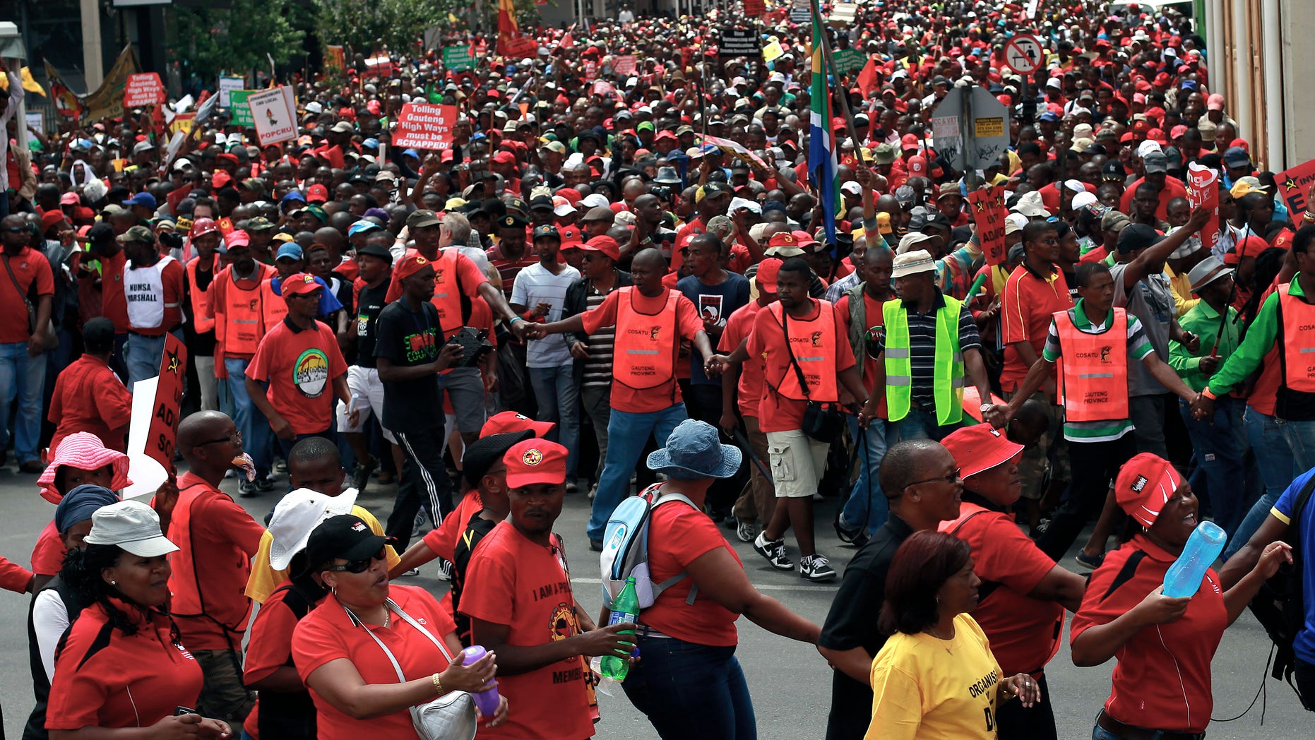 Mar. 7, 2012: South African protestors march downtown Johannesburg, South Africa.