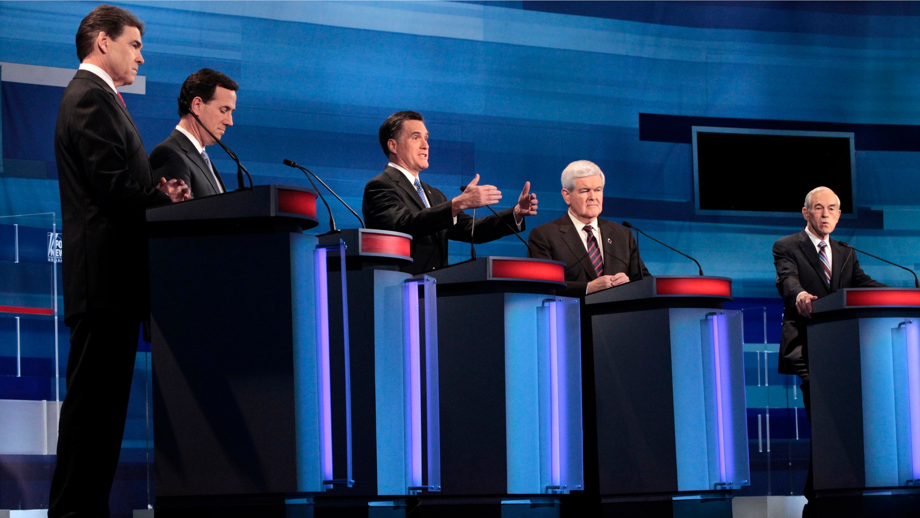 Republican presidential candidates, from left to right: Texas Gov. Rick Perry; former Pennsylvania Sen. Rick Santorum; former Massachusetts Gov. Mitt Romney; former House Speaker Newt Gingrich; and Rep. Ron Paul, R-Texas, participate in the South Carolina Republican presidential candidate debate in Myrtle Beach, S.C., Monday, Jan. 16, 2012. (AP Photo/Charles Dharapak, Pool)