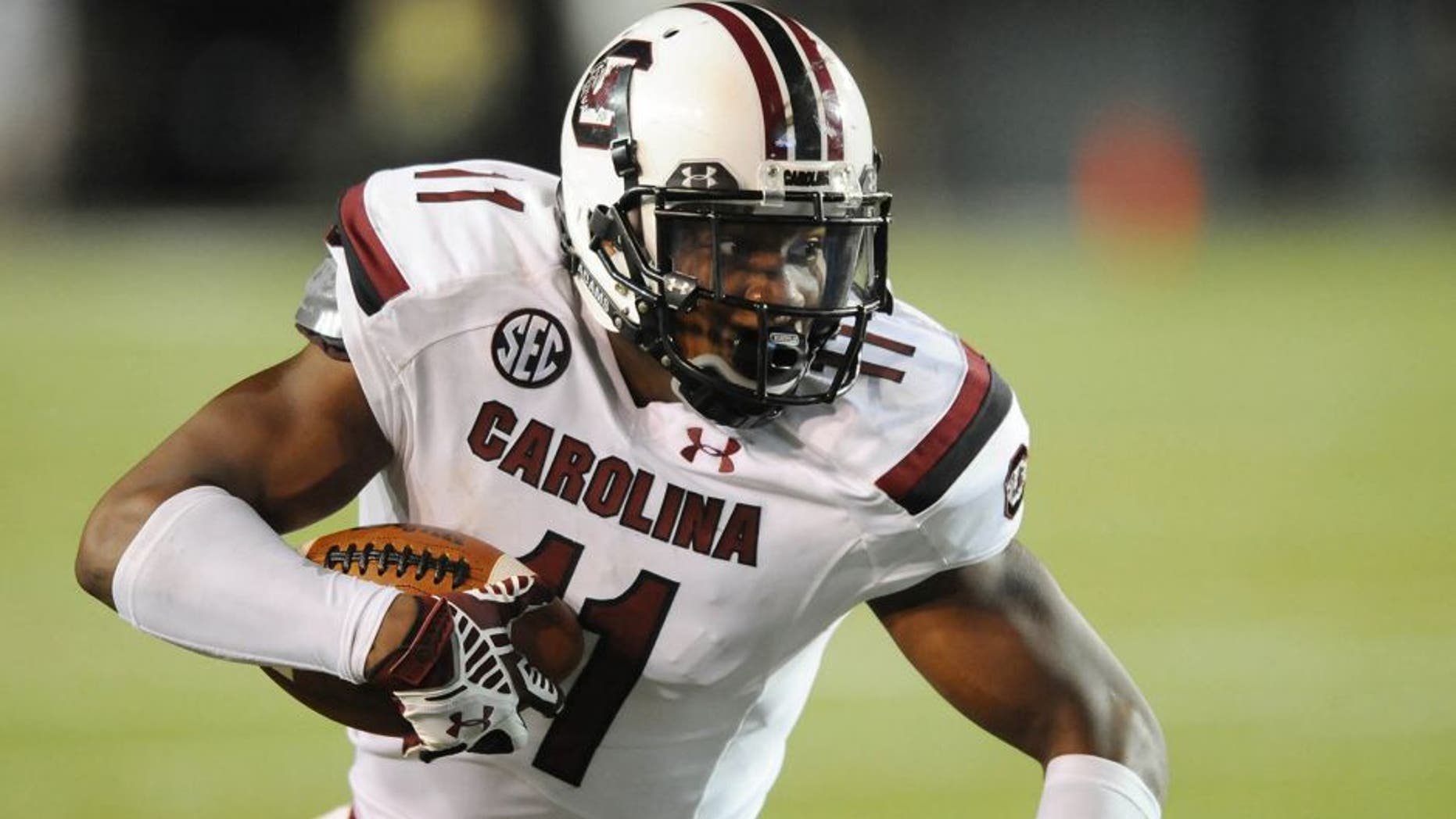 Sep 20, 2014; Nashville, TN, USA; South Carolina Gamecocks receiver Pharoh Cooper (11) runs for a first down during the second half against the Vanderbilt Commodores at Vanderbilt Stadium. South Carolina won 48-34. Mandatory Credit: Christopher Hanewinckel-USA TODAY Sports