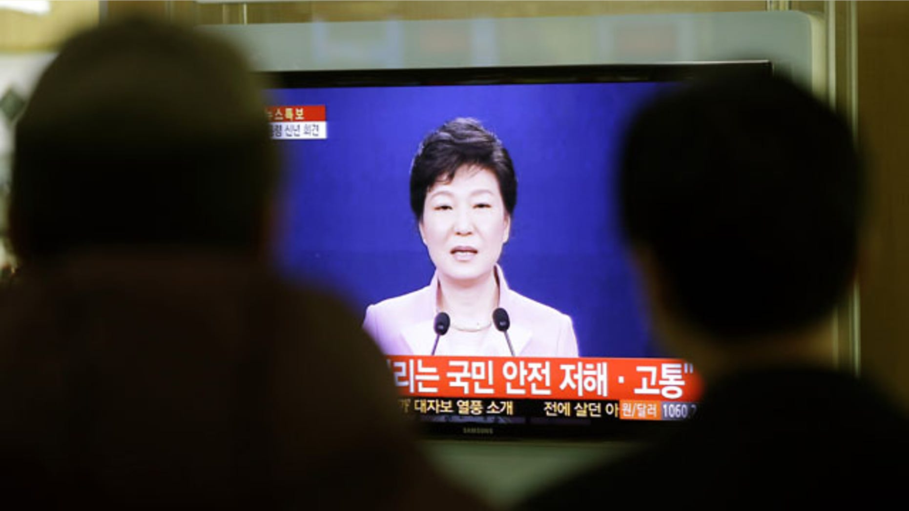 January 6, 2014: People watch a television program airing South Korean President Park Geun-hye's New Year's speech to the nation, at the Seoul Train Station. Park called on Monday for resuming reunions of families separated by war, saying it was a chance to improve strained ties between the rival Koreas. (AP Photo/Lee Jin-man)