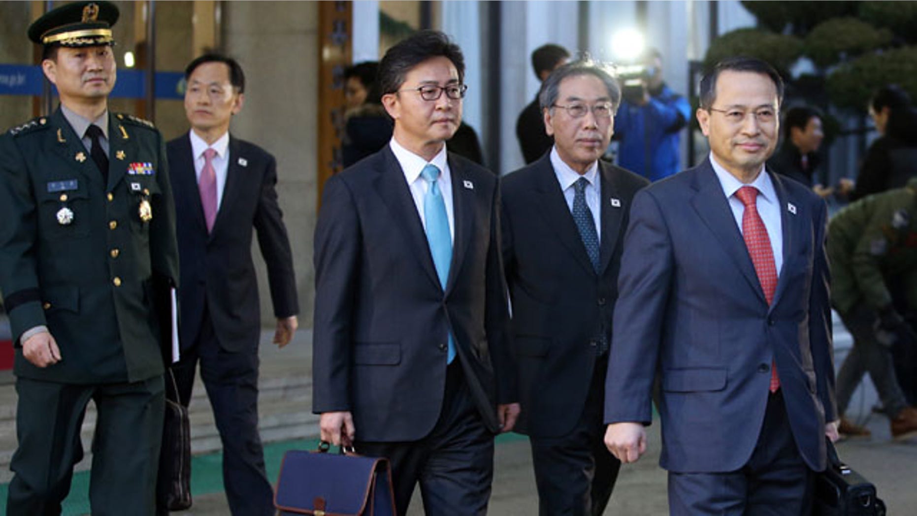 February 12, 2014: South Korean delegates leave for the border village of the Panumjom to meet their North Korean counterparts, at the Office of the South Korea-North Korea Dialogue in Seoul. (AP Photo/Yonhap, Kim Ju-song) KOREA OUT