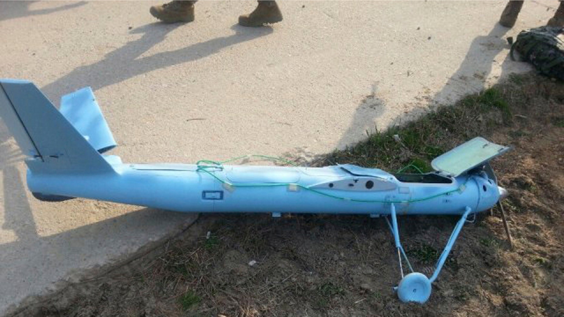 March 31, 2014: In this photo released by the South Korea Defense Ministry, an unmanned drone lies on the ground damaged on Baengnyeong Island, South Korea, near the West Sea border with North Korea when the two Koreas fired hundreds of artillery shells into each other's waters. South Korea suspects that the drone that crashed on the frontline South Korean island was flown by rival North Korea, an official said Wednesday. (AP Photo/South Korea Defense Ministry)