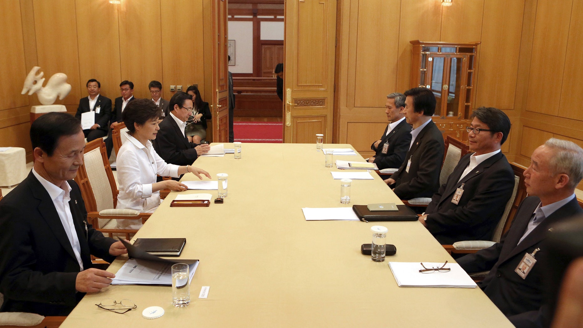 June 10, 2013 - South Korean President Park Geun-hye, 2nd from left, presides over a security meeting to discuss the upcoming South and North Korea talks at the presidential house in Seoul, South Korea.