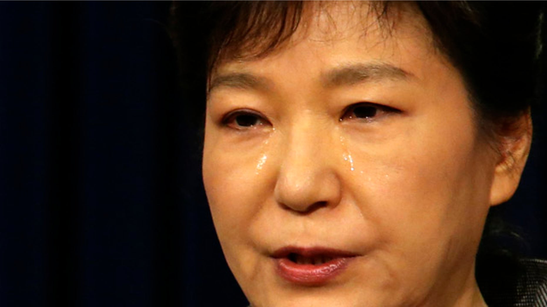 May 19, 2014: South Korean President Park Geun-hye weeps while delivering a speech to the nation about the sunken ferry Sewol at the presidential Blue House in Seoul. (AP Photo/Yonhap, Do Kwang-hwan)