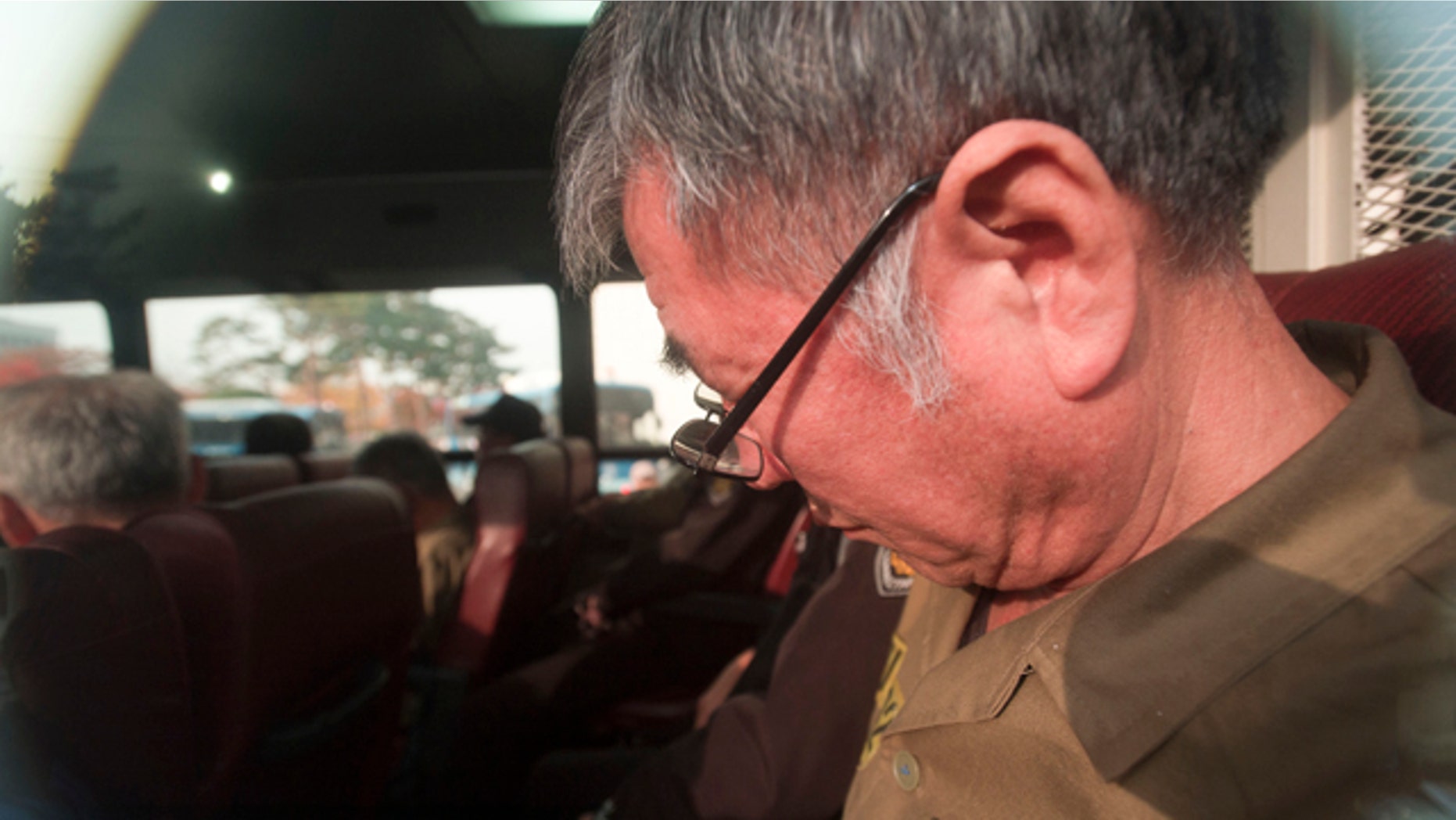 November 11, 2014: Lee Joon-seok, the captain of the sunken South Korean ferry Sewol arrives for verdict and sentence session at Gwangju District Court in Gwangju, South Korea. (AP Photo/Yonhap, Hyung Min-woo)
